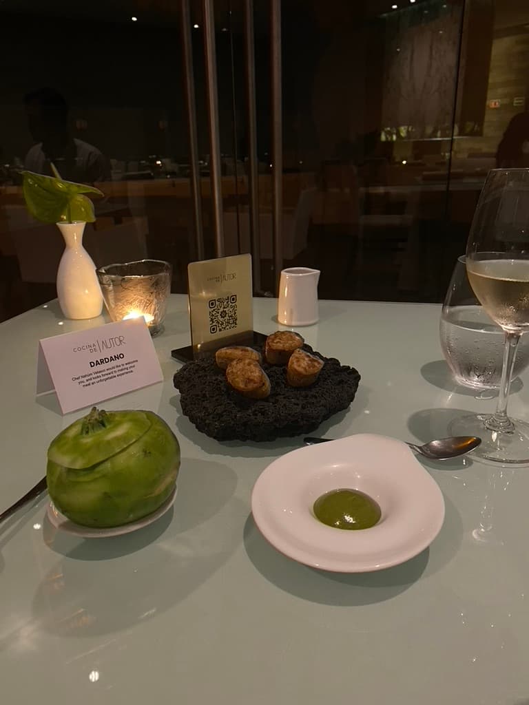 A dining table in a dimly lit room