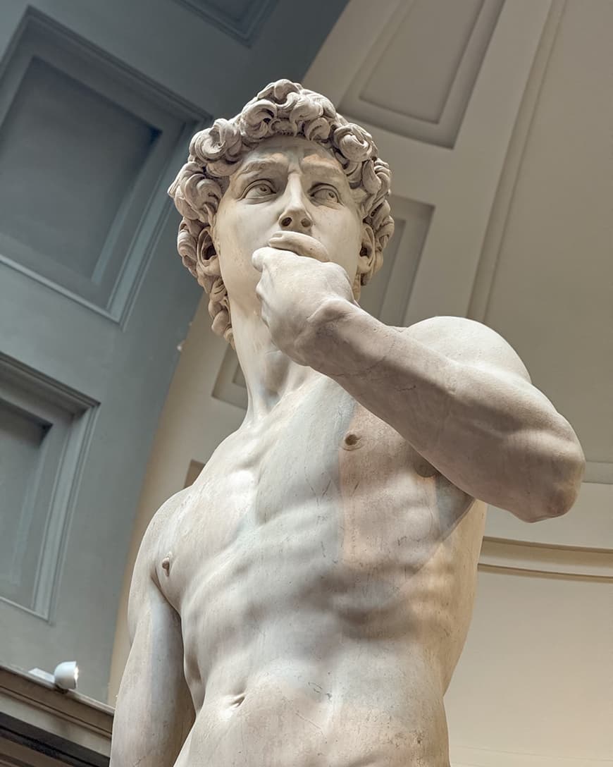 A statue of a man inside a museum