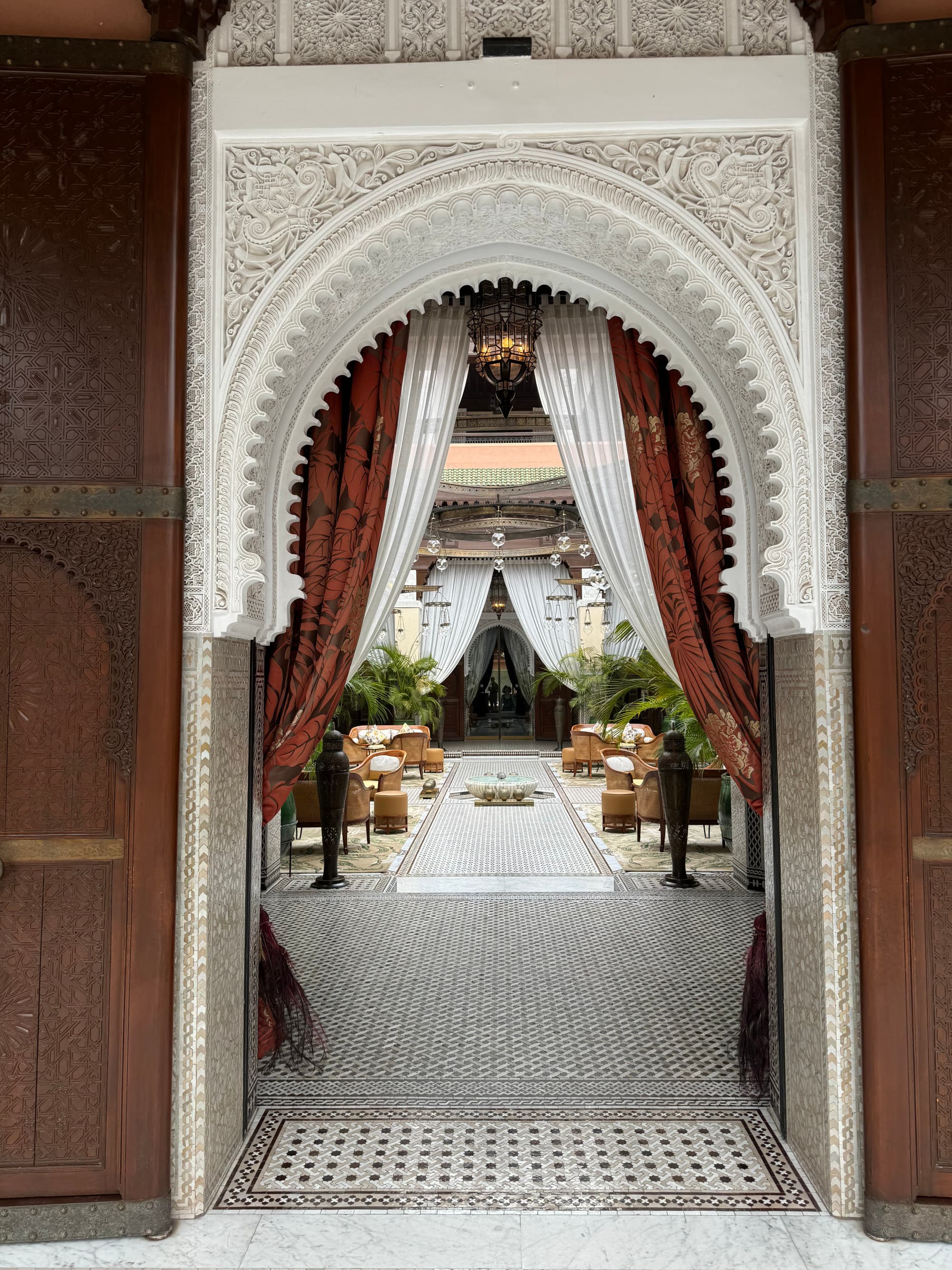 An entrance into a hotel reception area