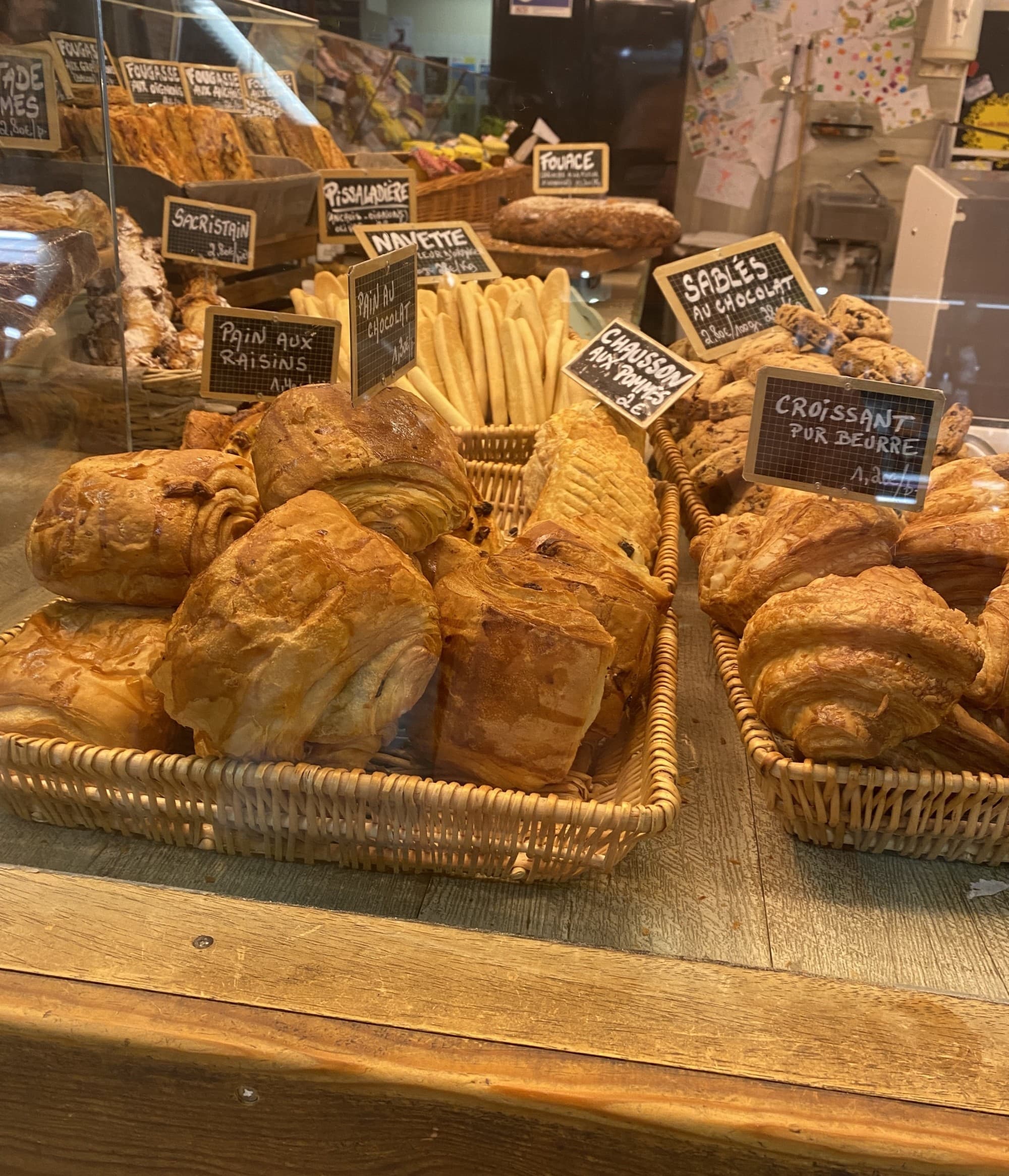 Various breads and pastries on display on a table
