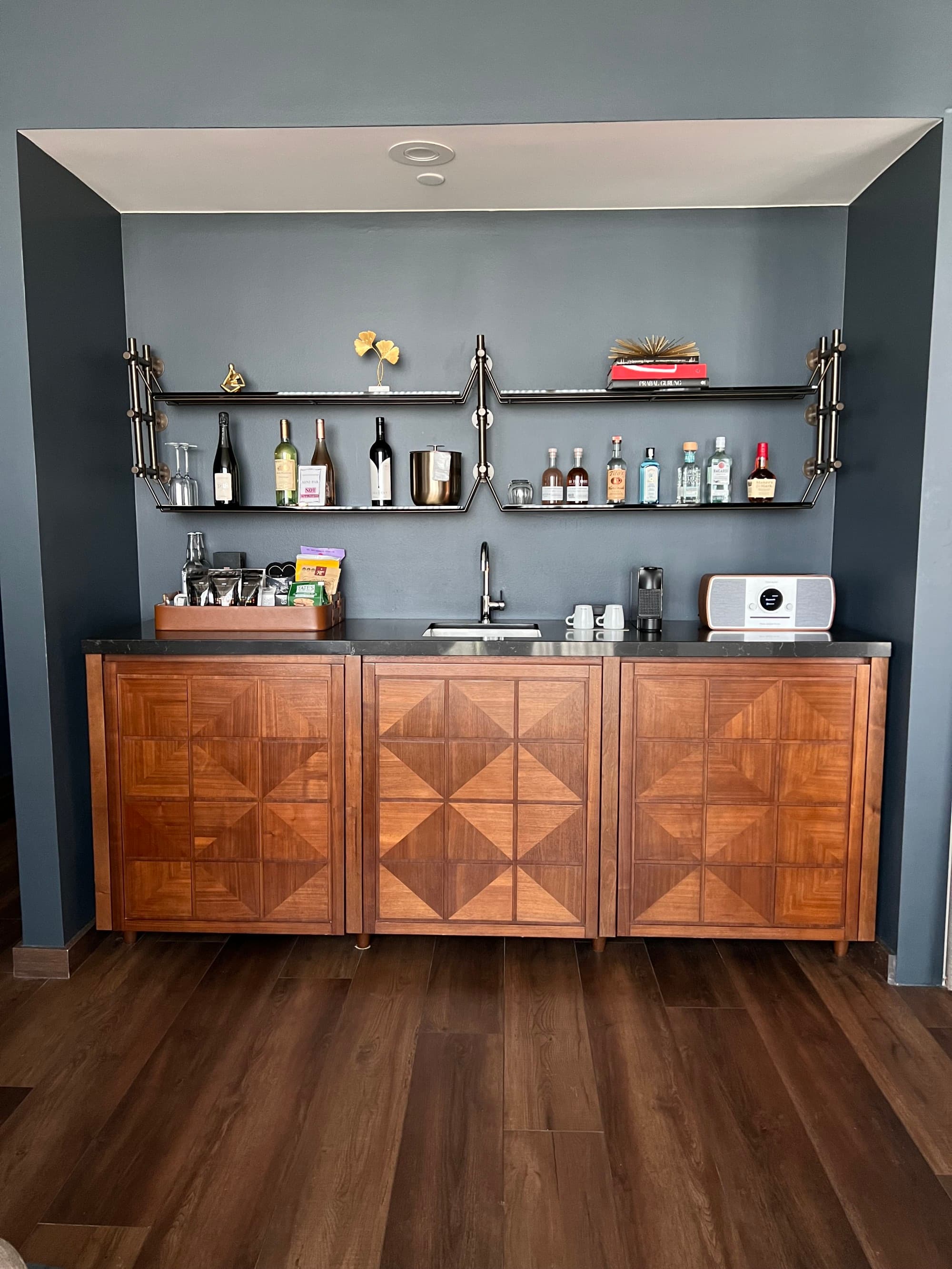 A small bar in a hotel room