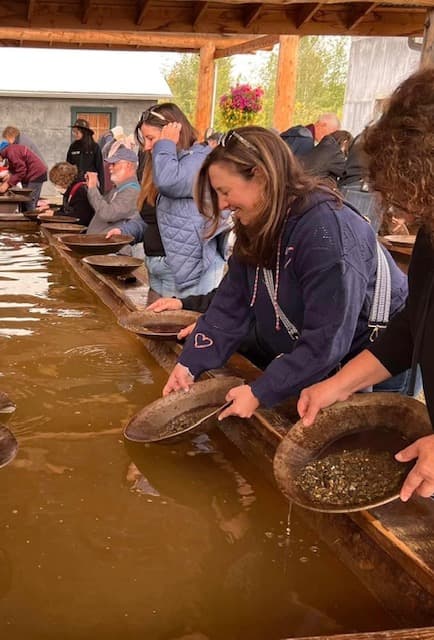 Mindy dredging for gold - Mindy Levin