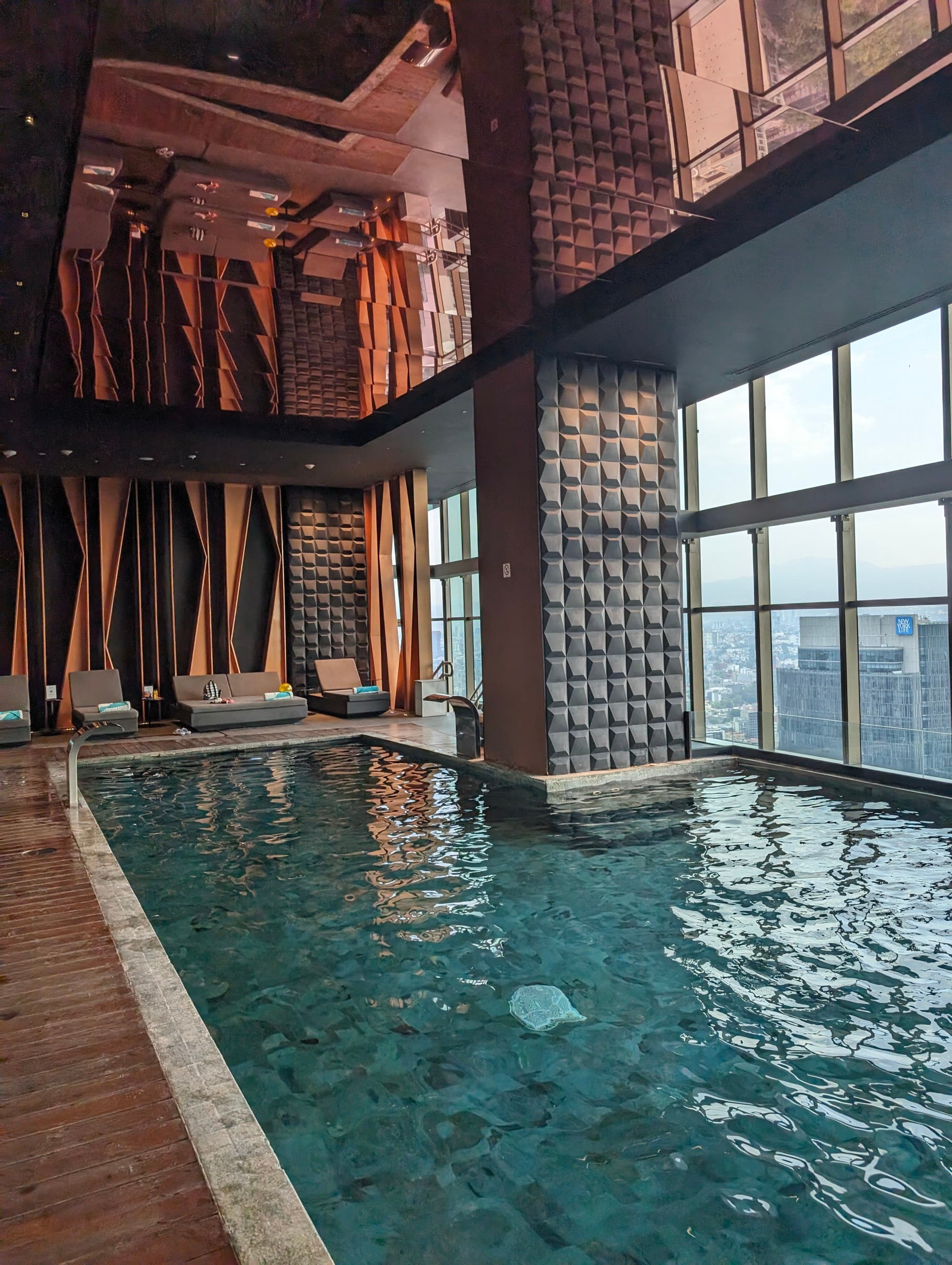 A view of the indoor pool on a high floor at the Sofitel Mexico City, Reforma with a city view