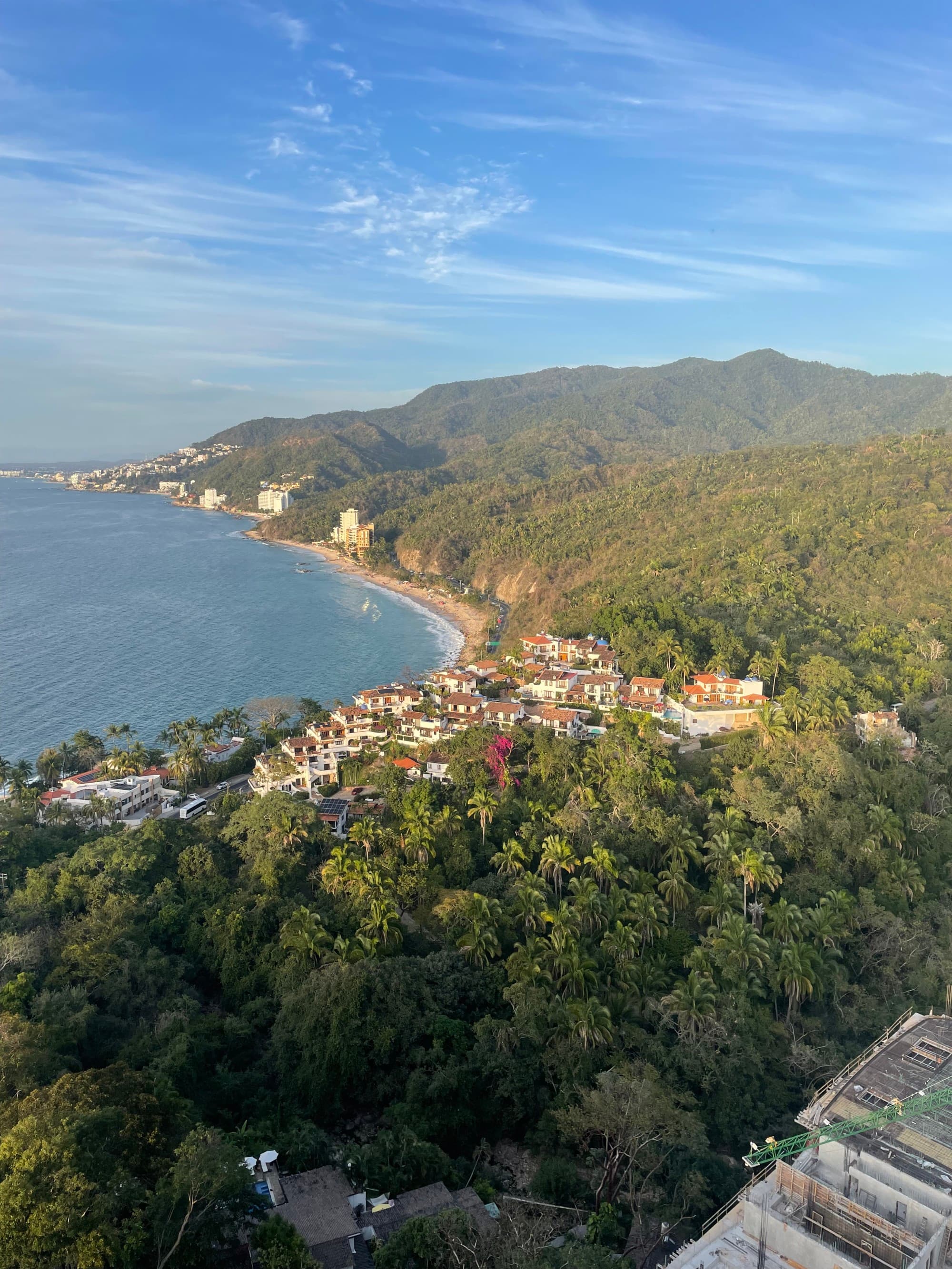 Aerial view of the island next to the water during the daytime