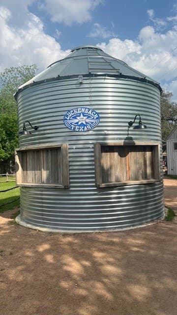 A round tin building during the daytime