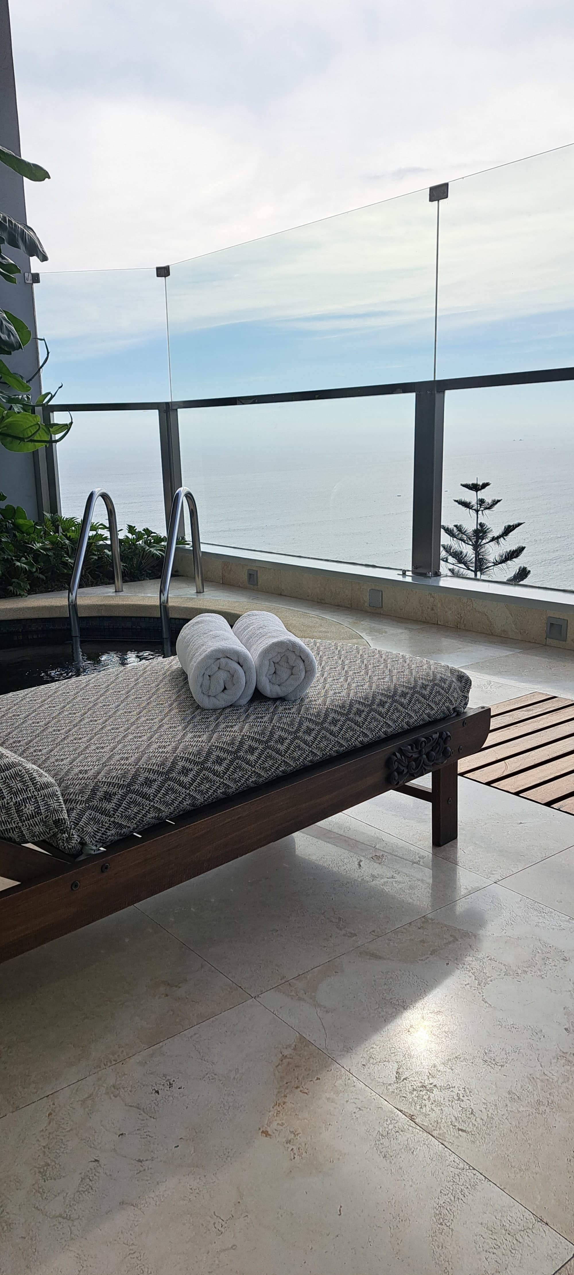 A lounge bed of a pool area