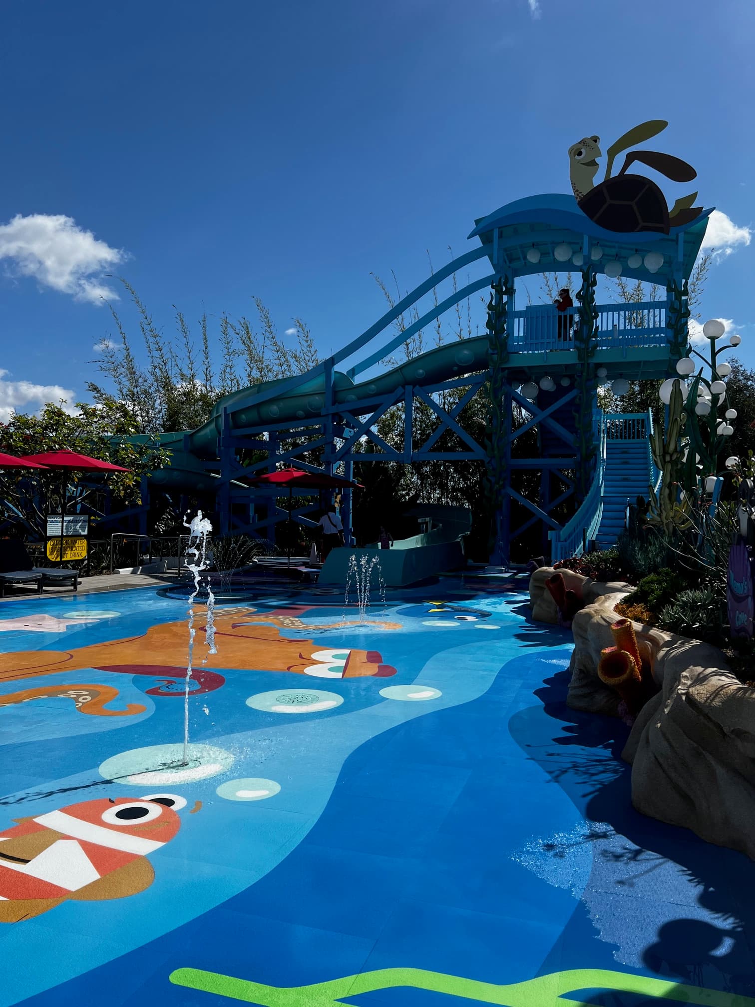 An outdoor water park splash area