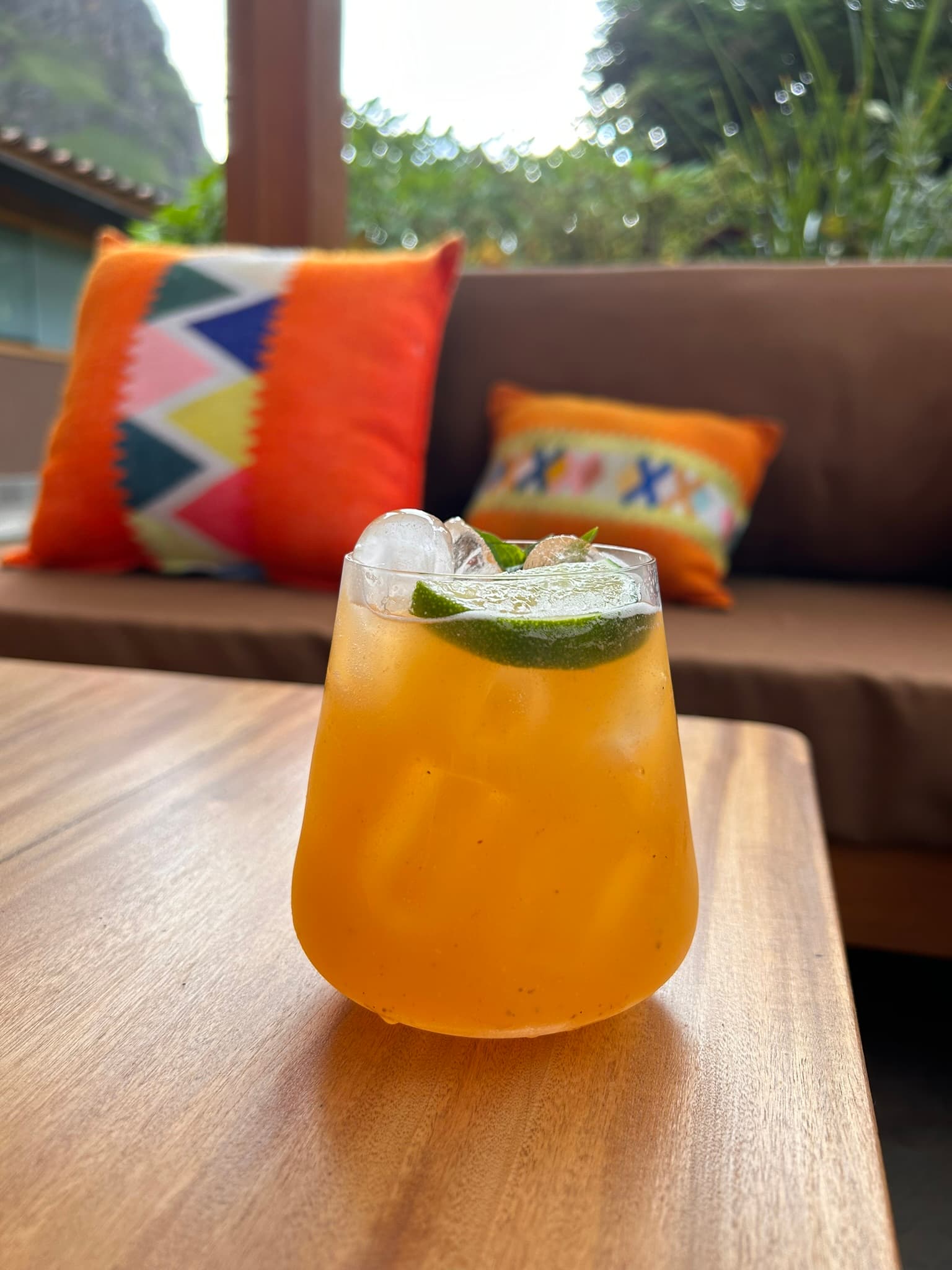 A cocktail on a wooden table