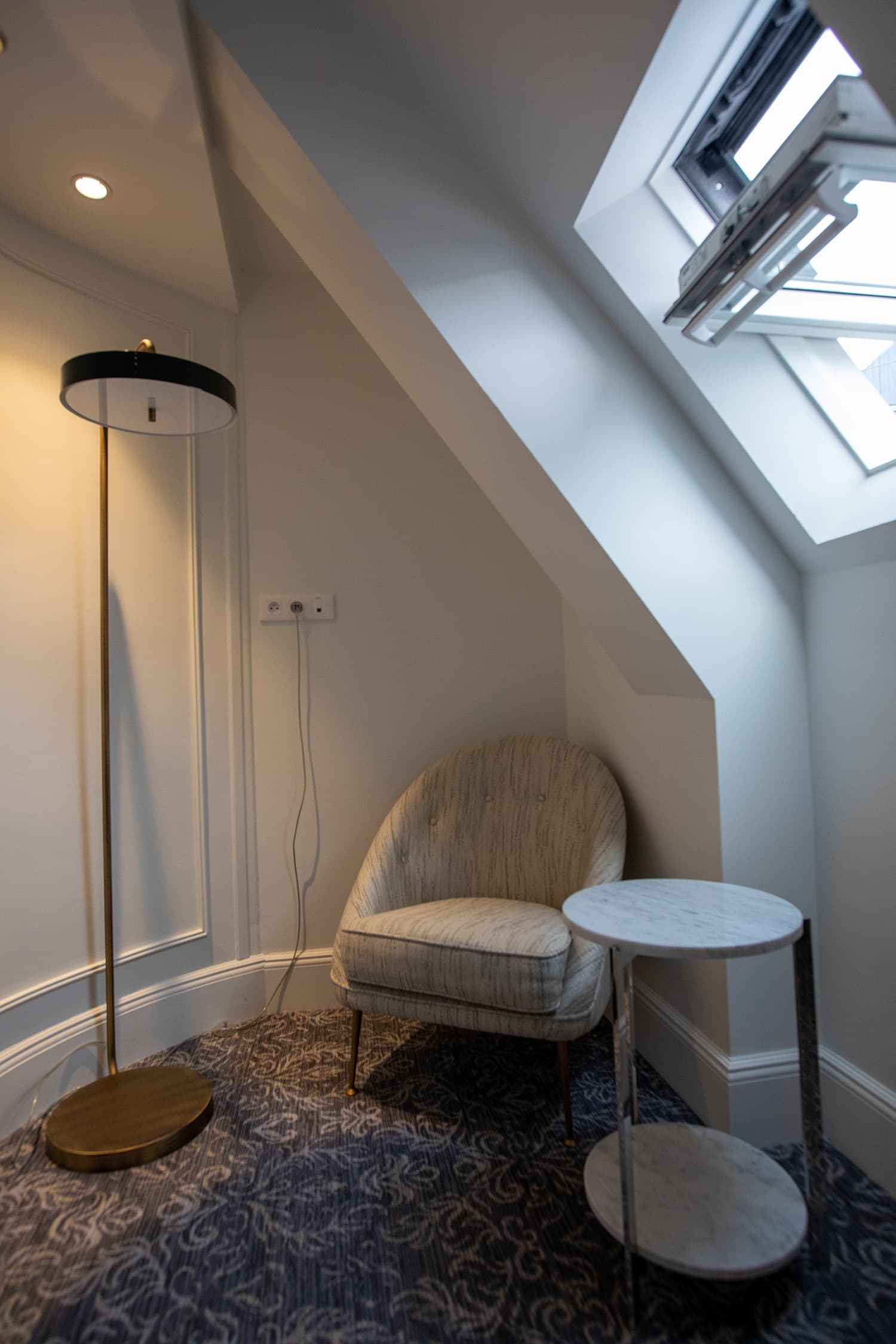 A seating area in a hotel room