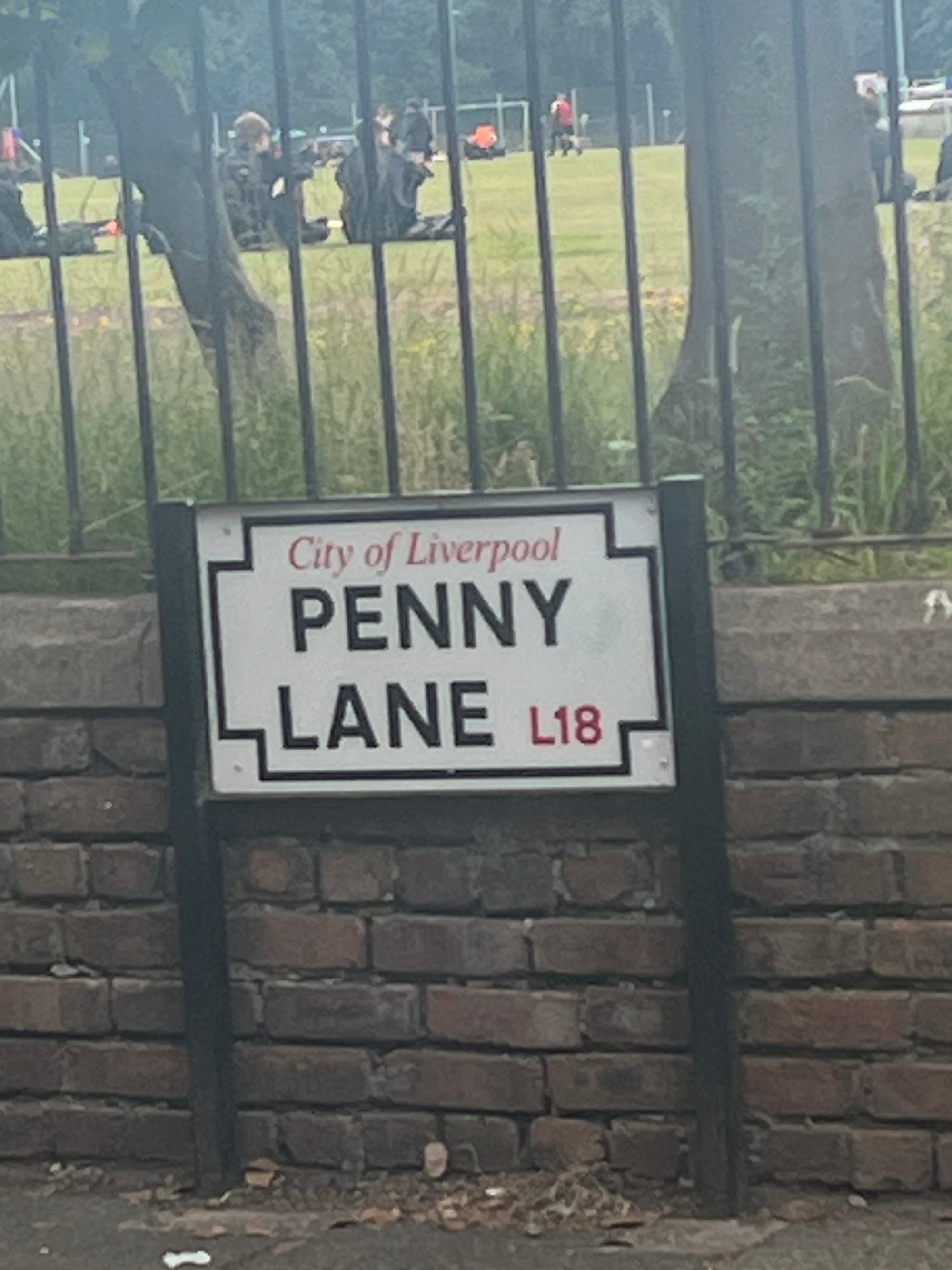 A street sign reading "Penny Lane"