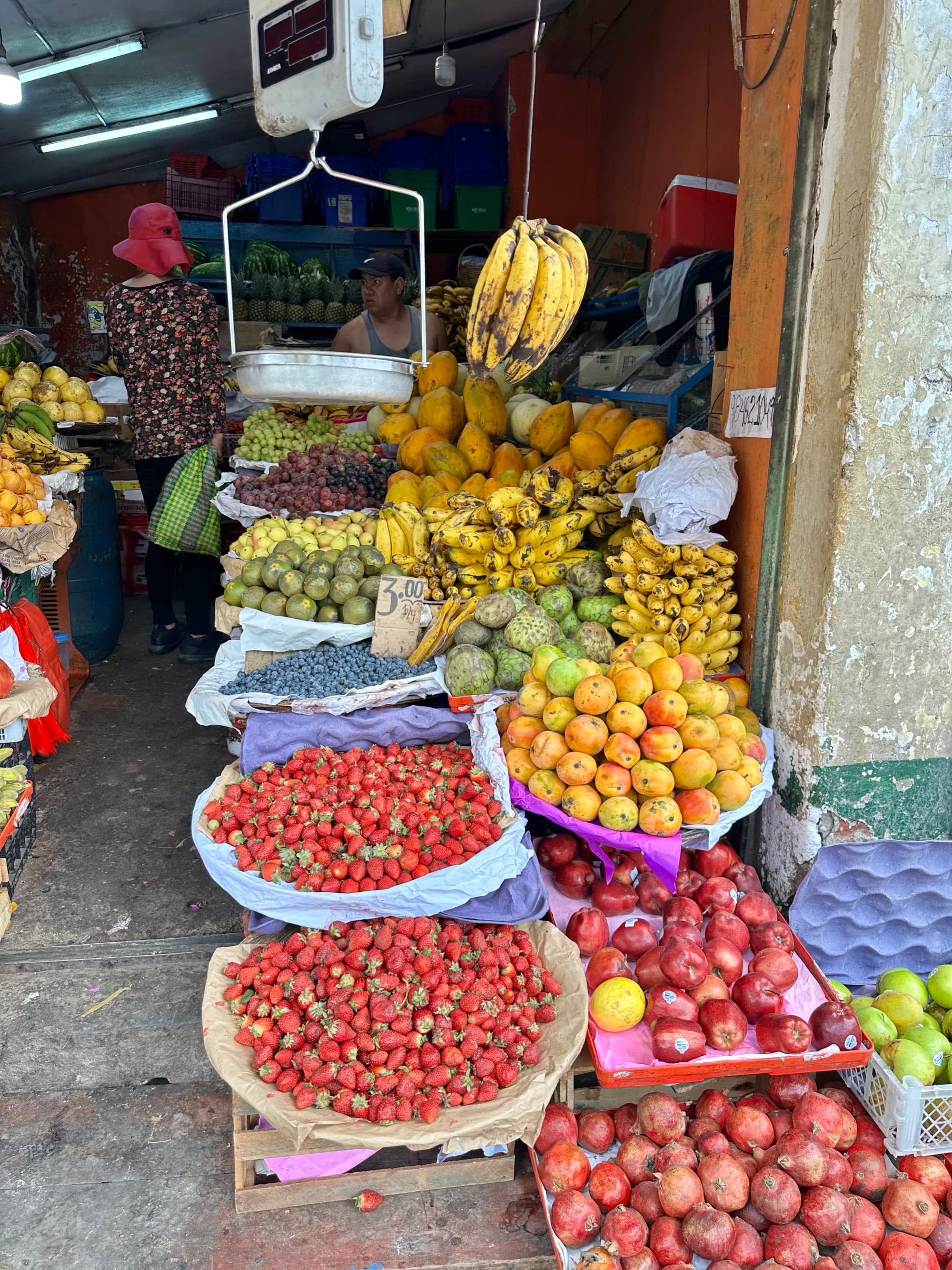 Fruit shop with a variety of foods on display
