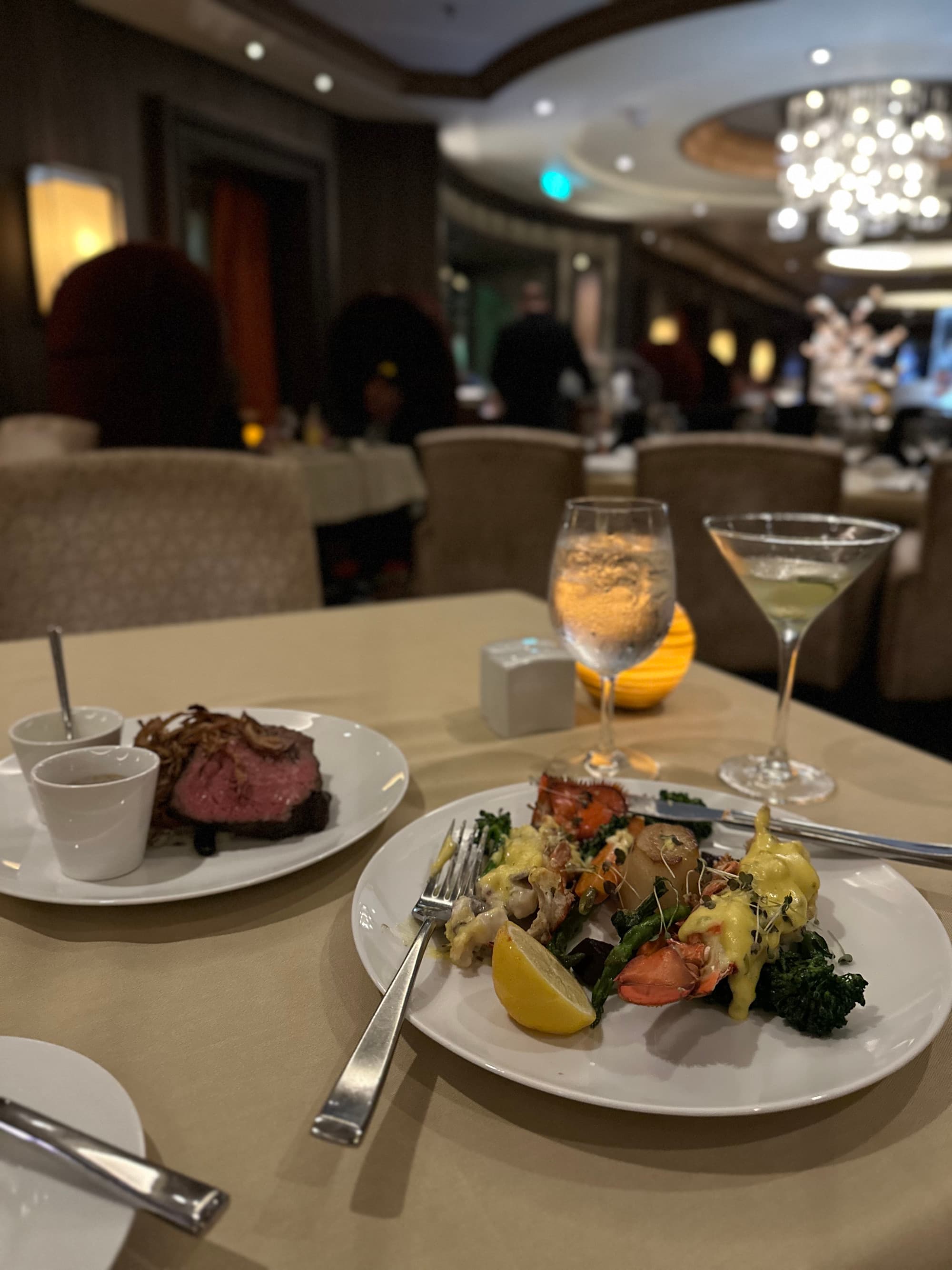 Plates of food on a table in an inside seating area