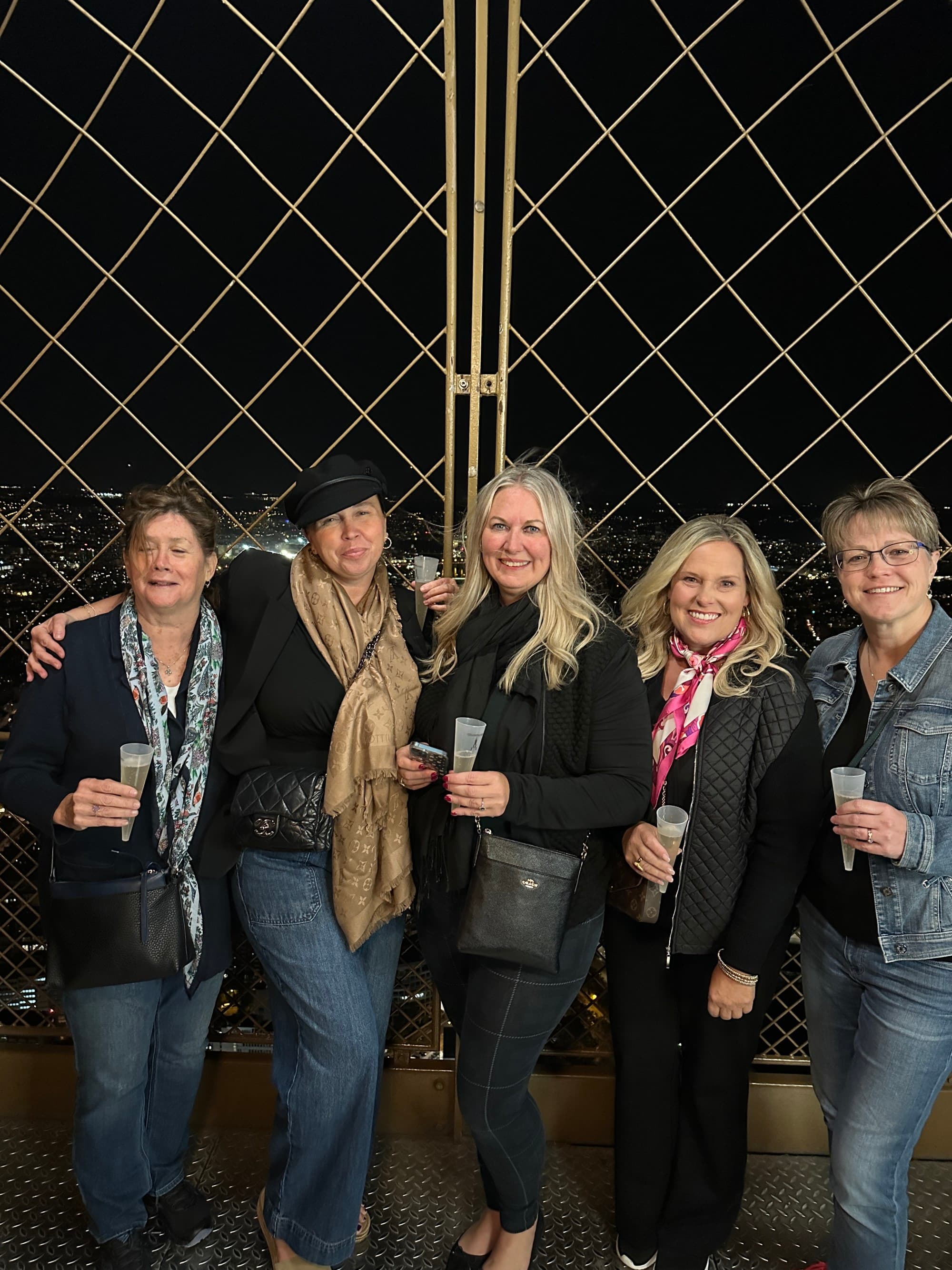 pic of the ladies is at the top of the eiffel tower