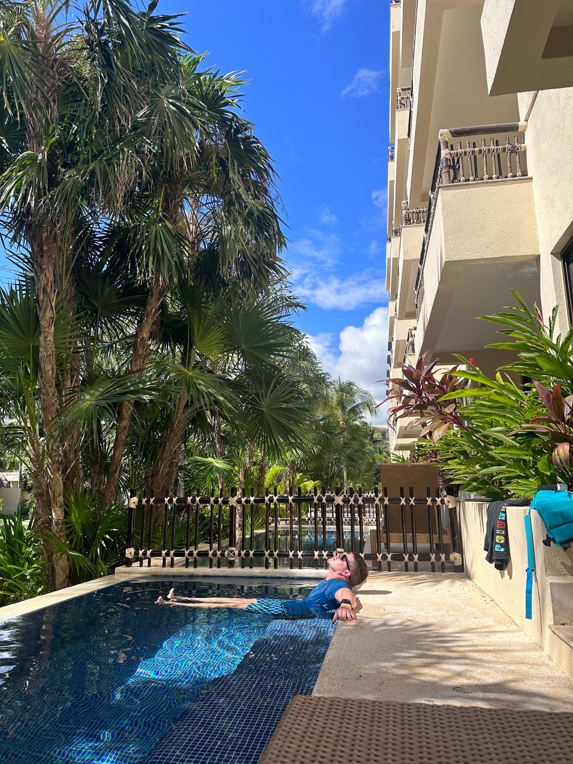 An outside pool by a hotel