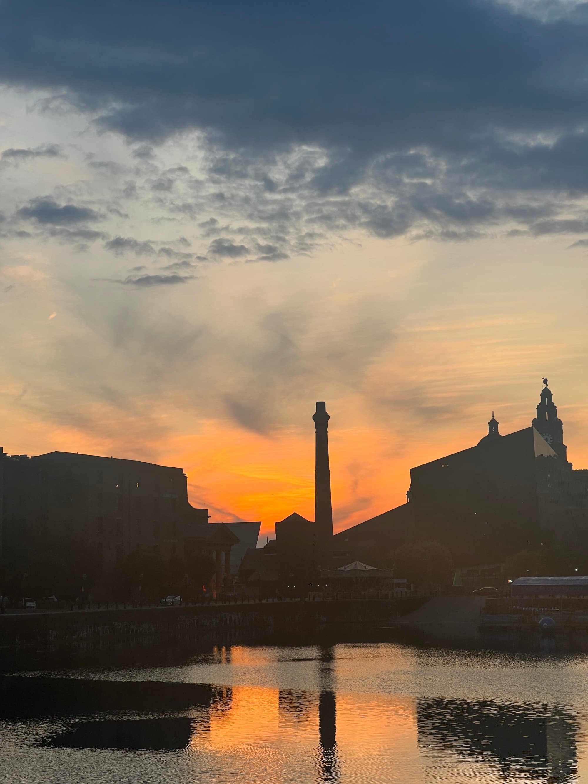 A sunset over a body of water