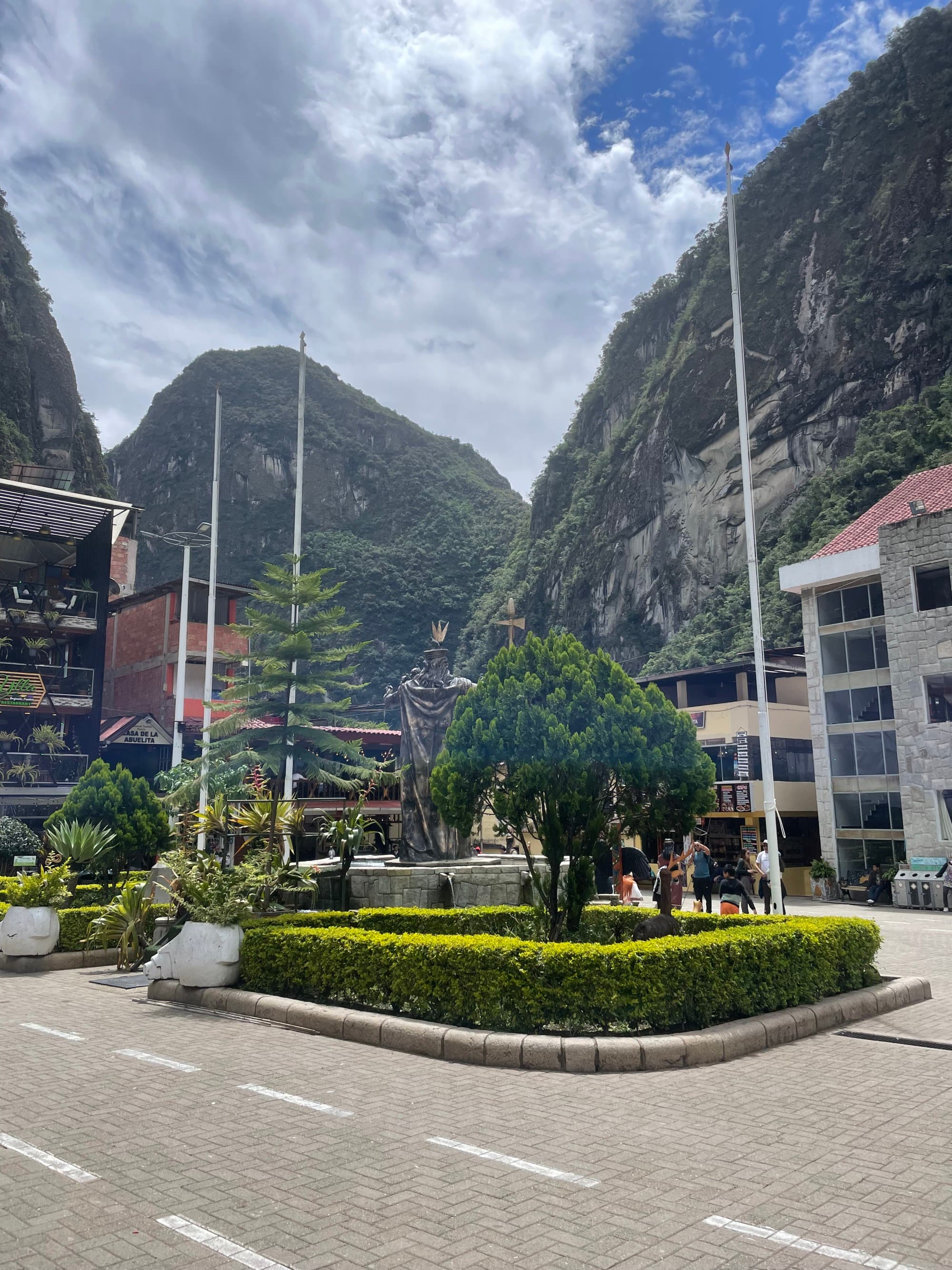A road in a village surrounded by mountains