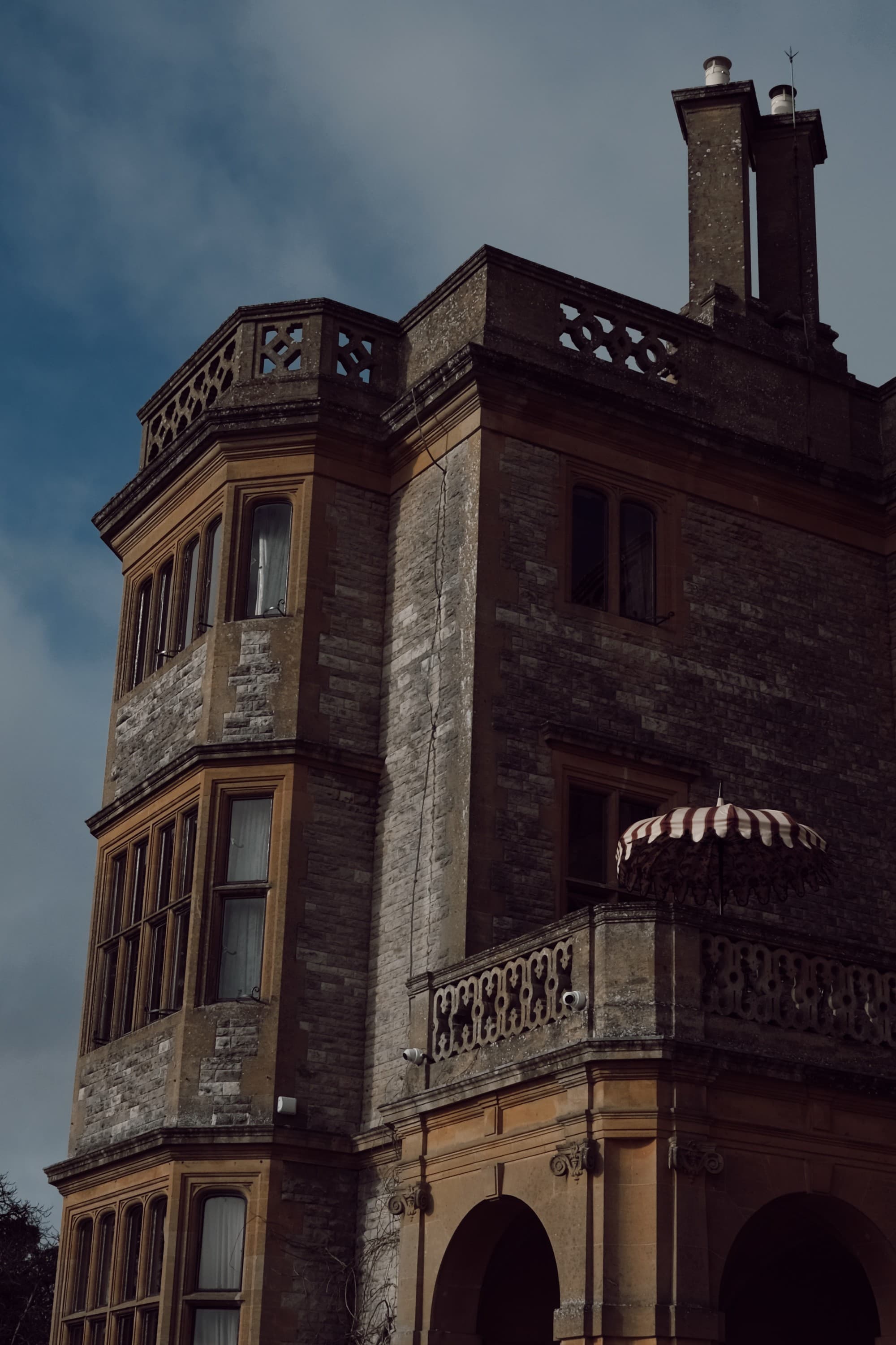 The outside of a tall, brick building during the daytime