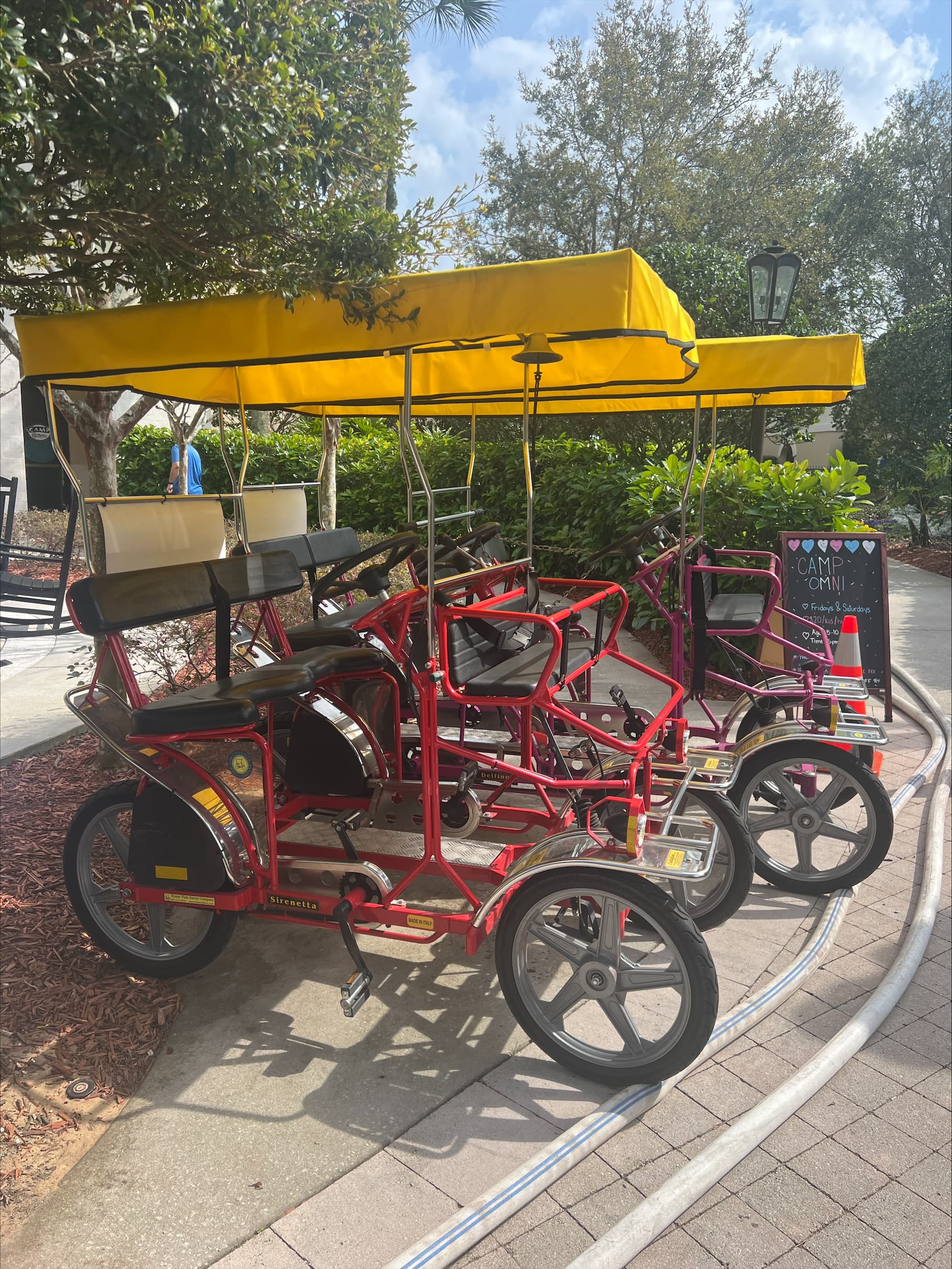 Red bikes with yellow tent roofs