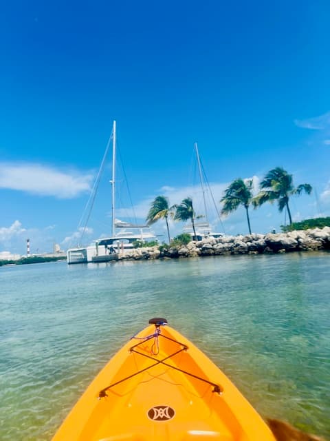 A yellow kayak on the water during the daytime