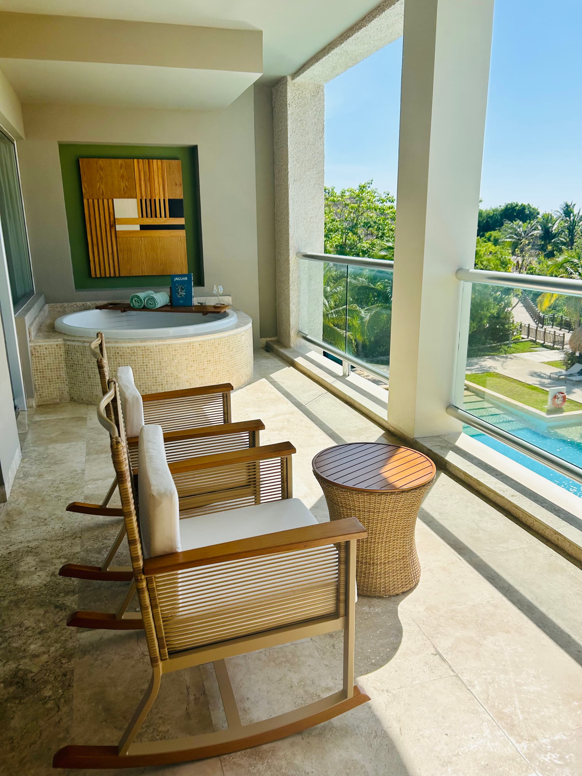 Two rocking chairs on a balcony