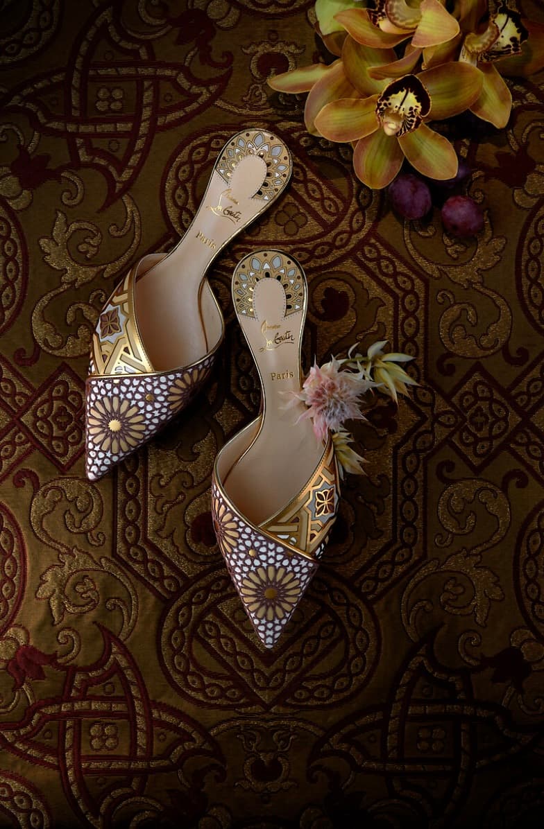 gold and white fancy slippers