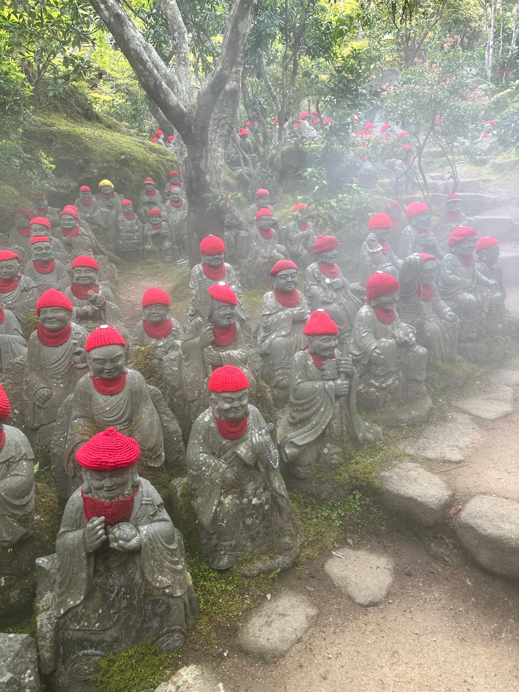 Statues in front of a temple.