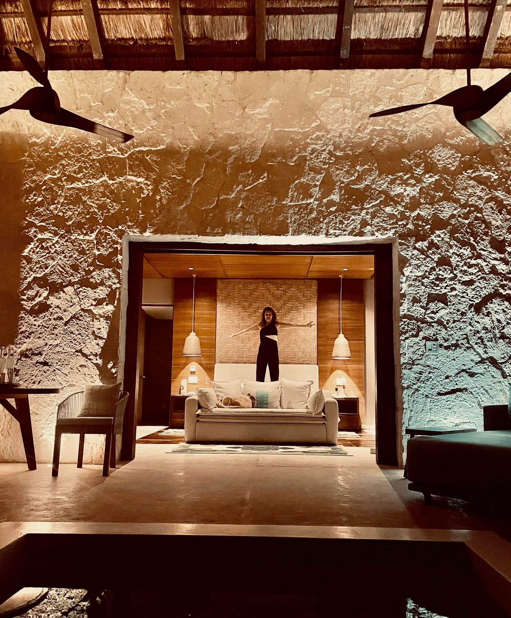 Hotel interior with exposed beams.