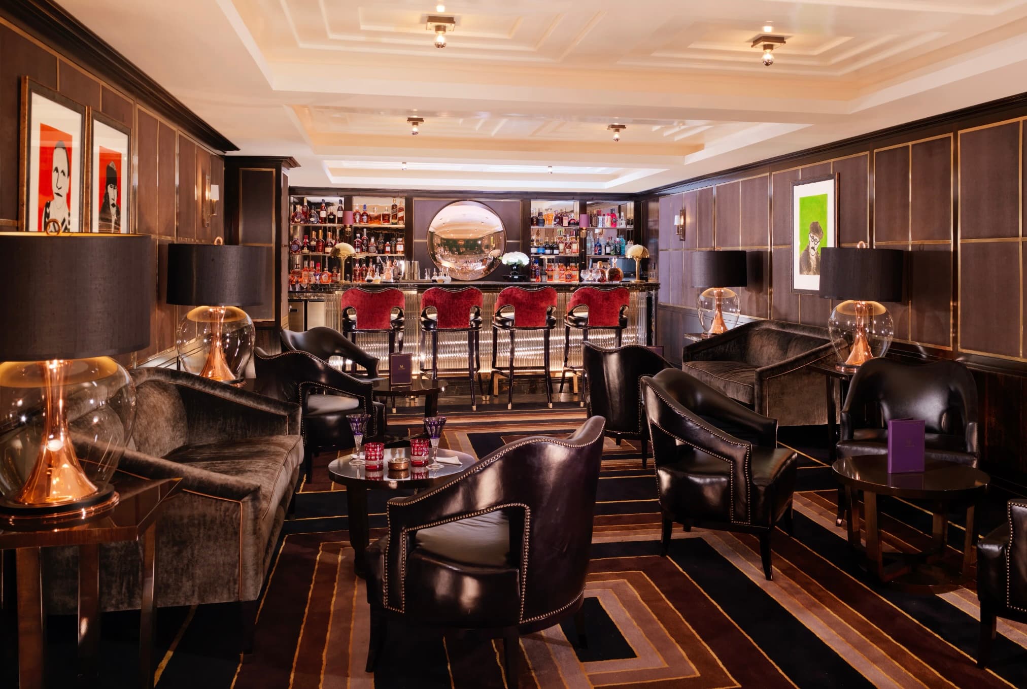 small bar with stools and dark upholstery