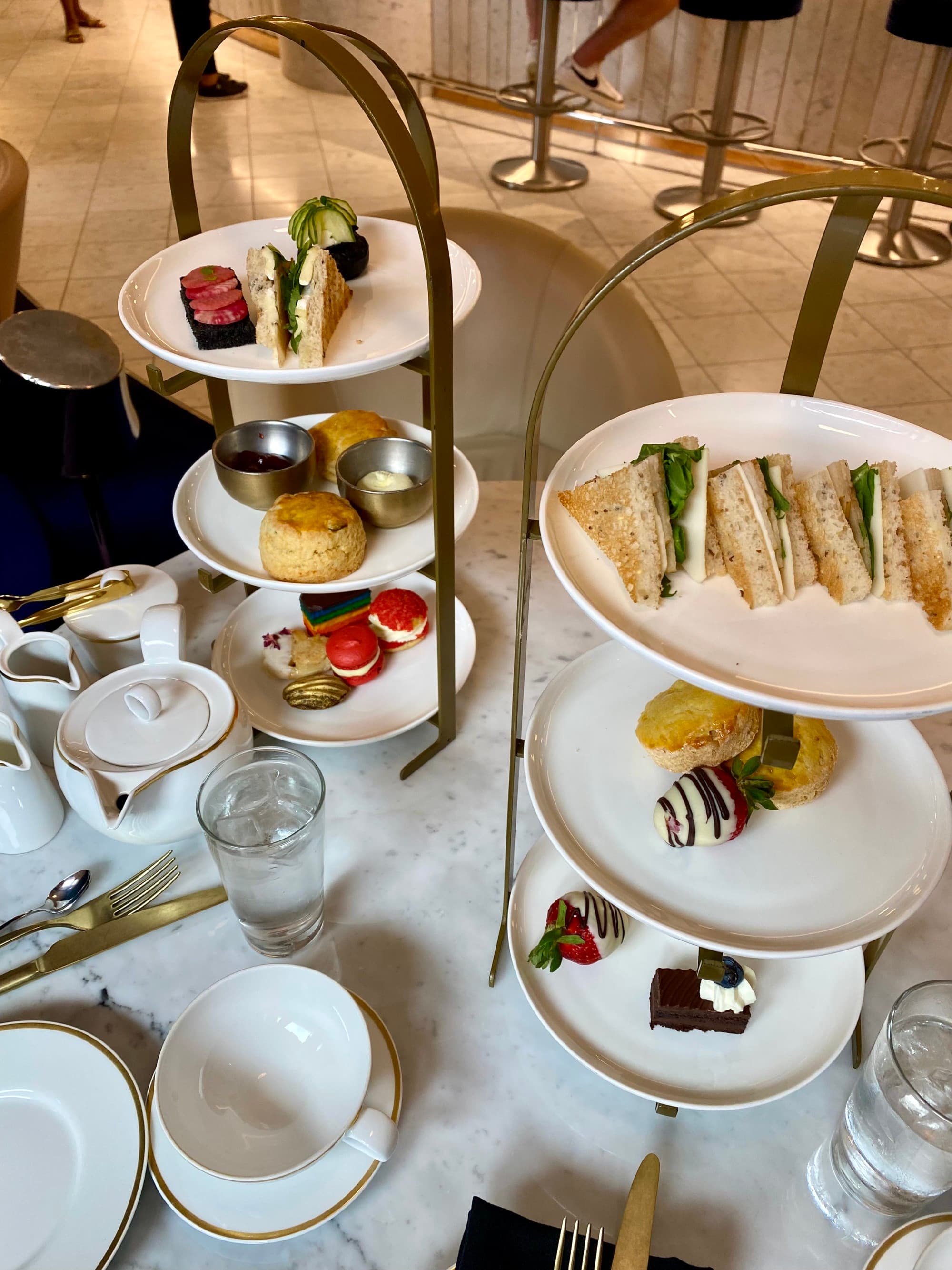 Food on tiered plates on a table