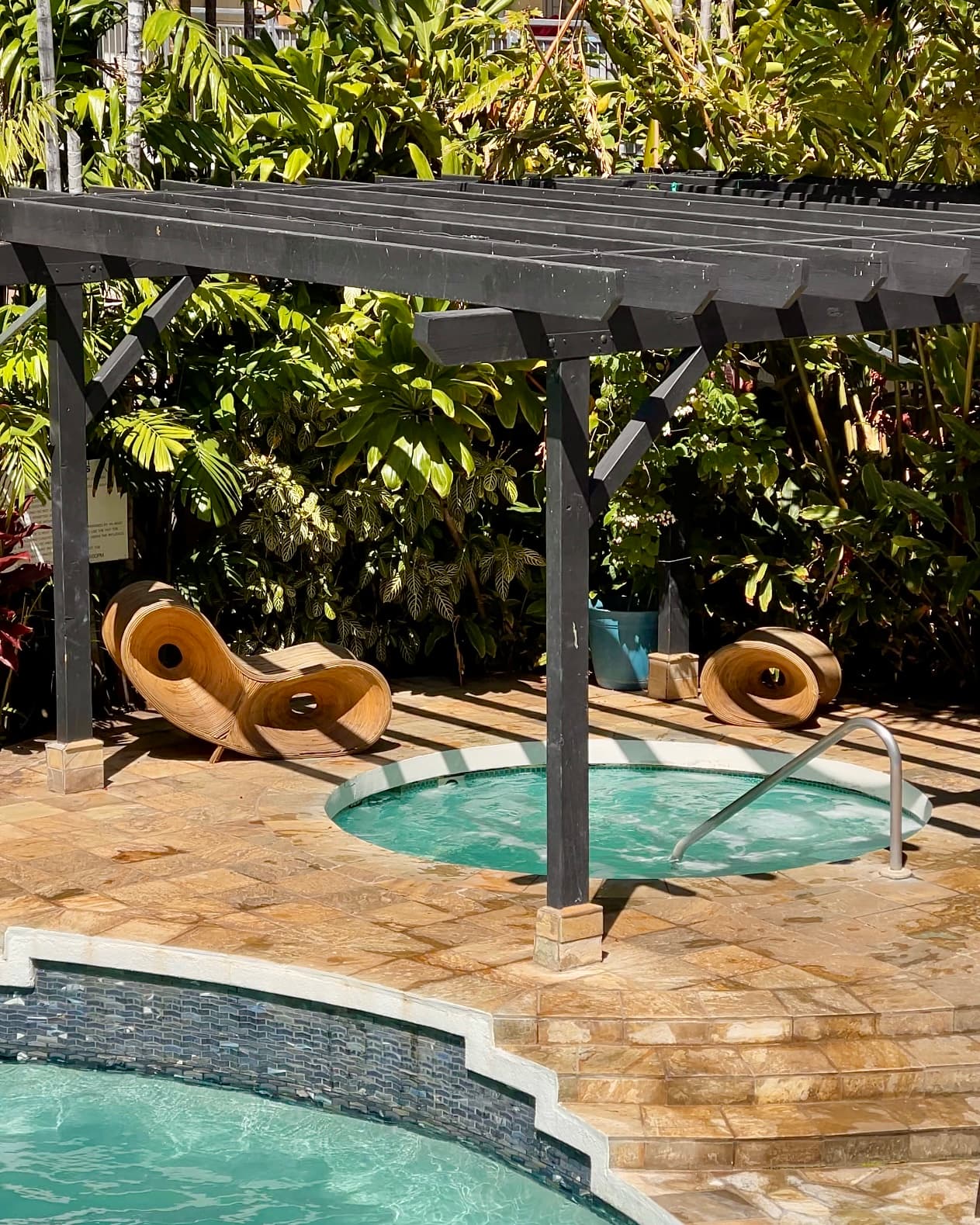 Hot tubs built into a brick patio outside