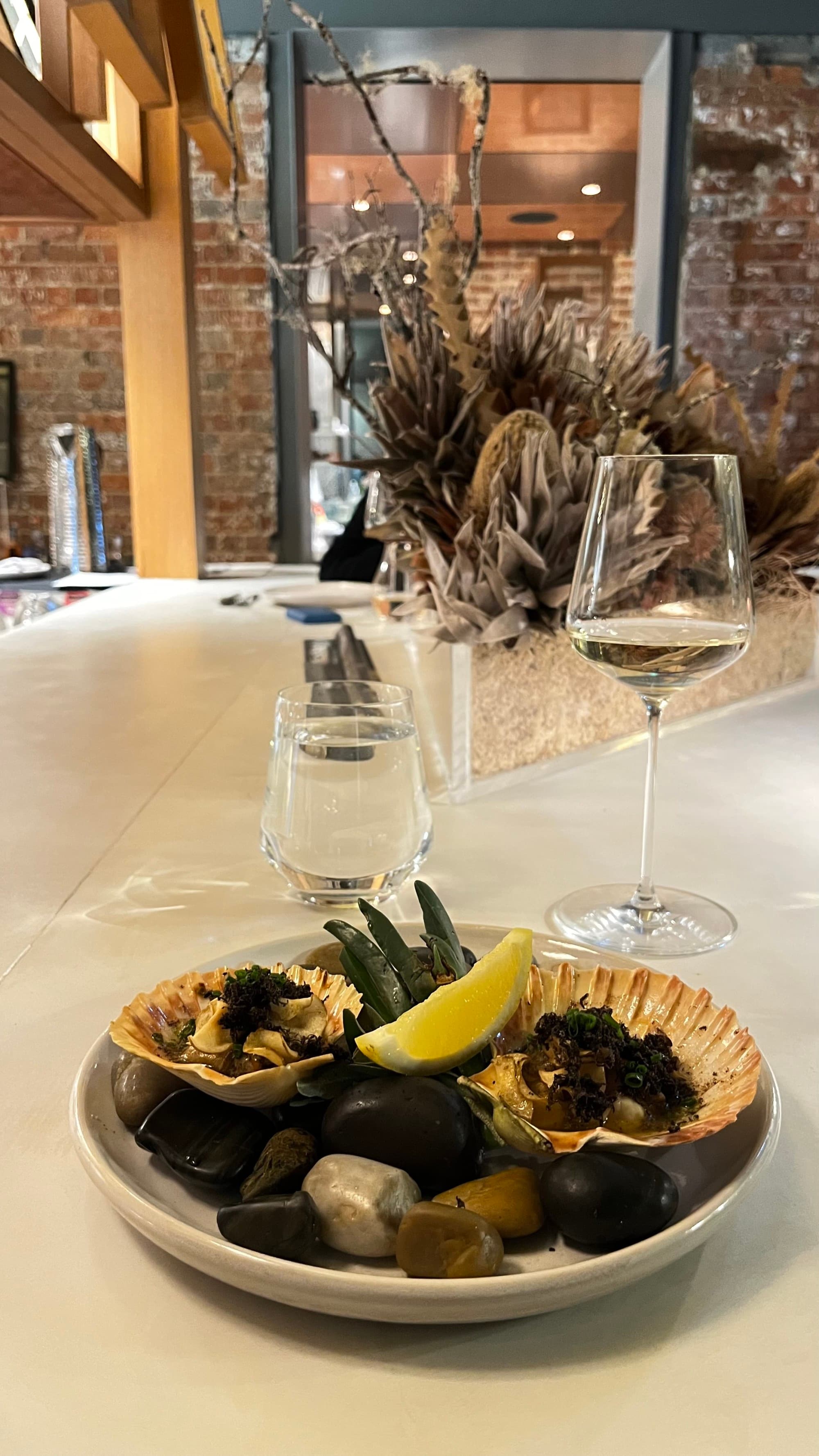 Dish of clams artfully arranged at The Tasman.