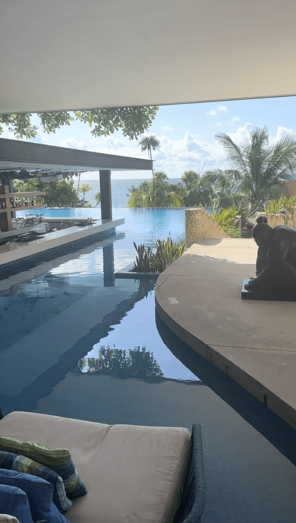 An outside swimming pool area during the daytime