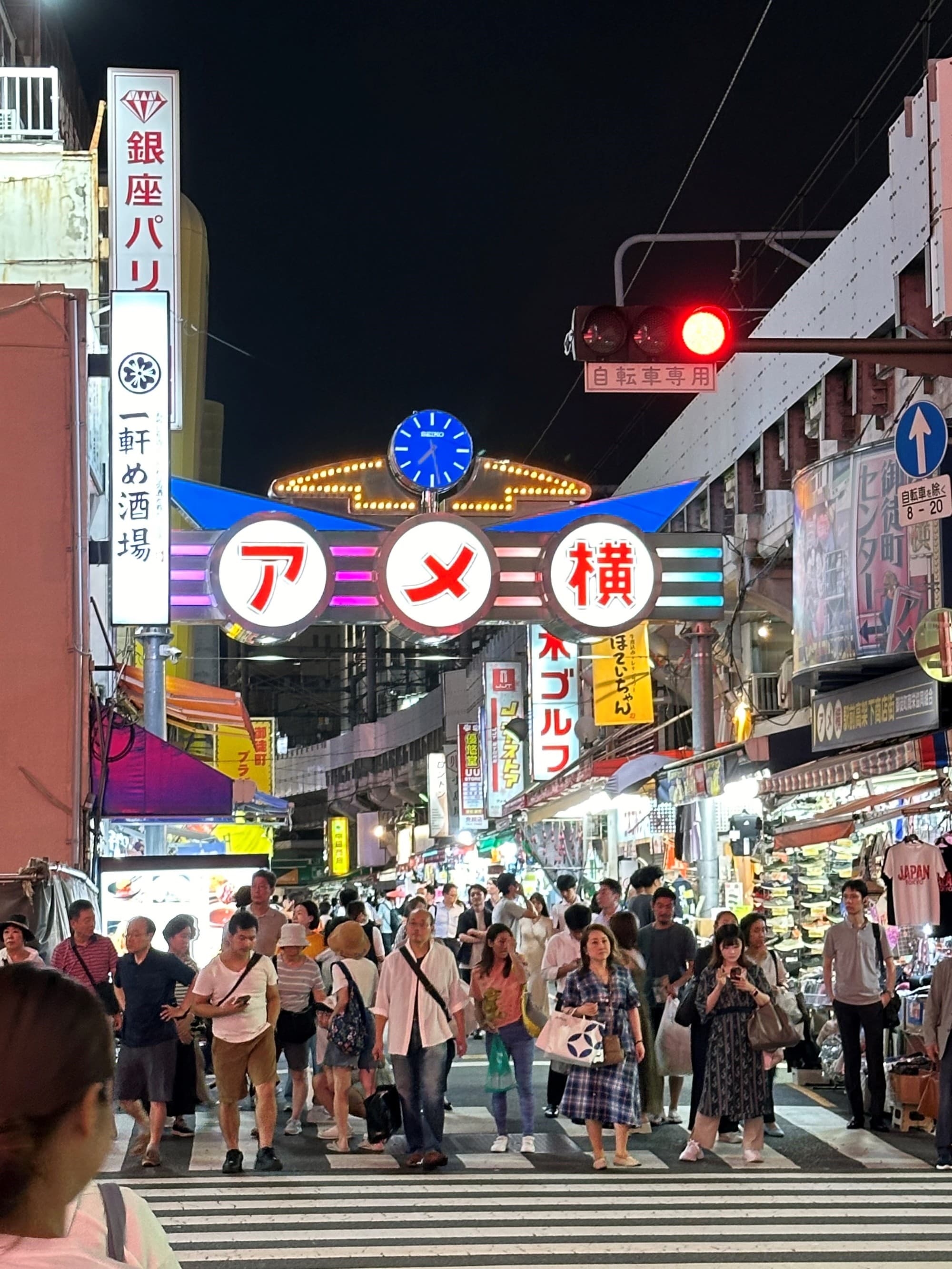A bustling city street at nighttime