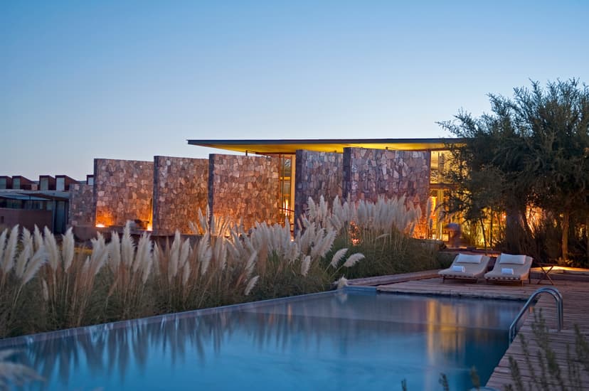 a sleek pool deck in the desert