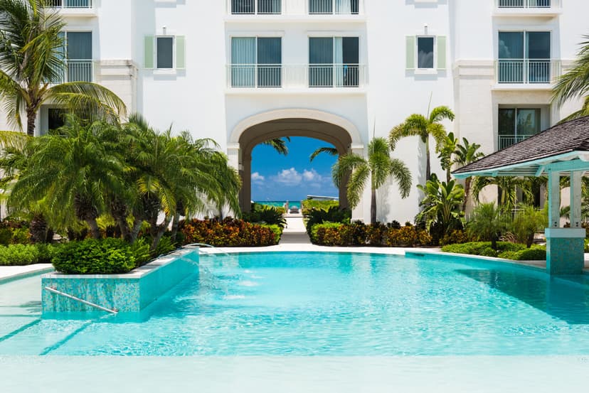 outdoor swimming pool in a sunny oceanfront courtyard
