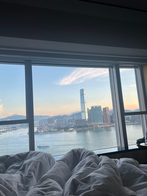 A view of Hong Kong as the sun rises from a hotel window.
