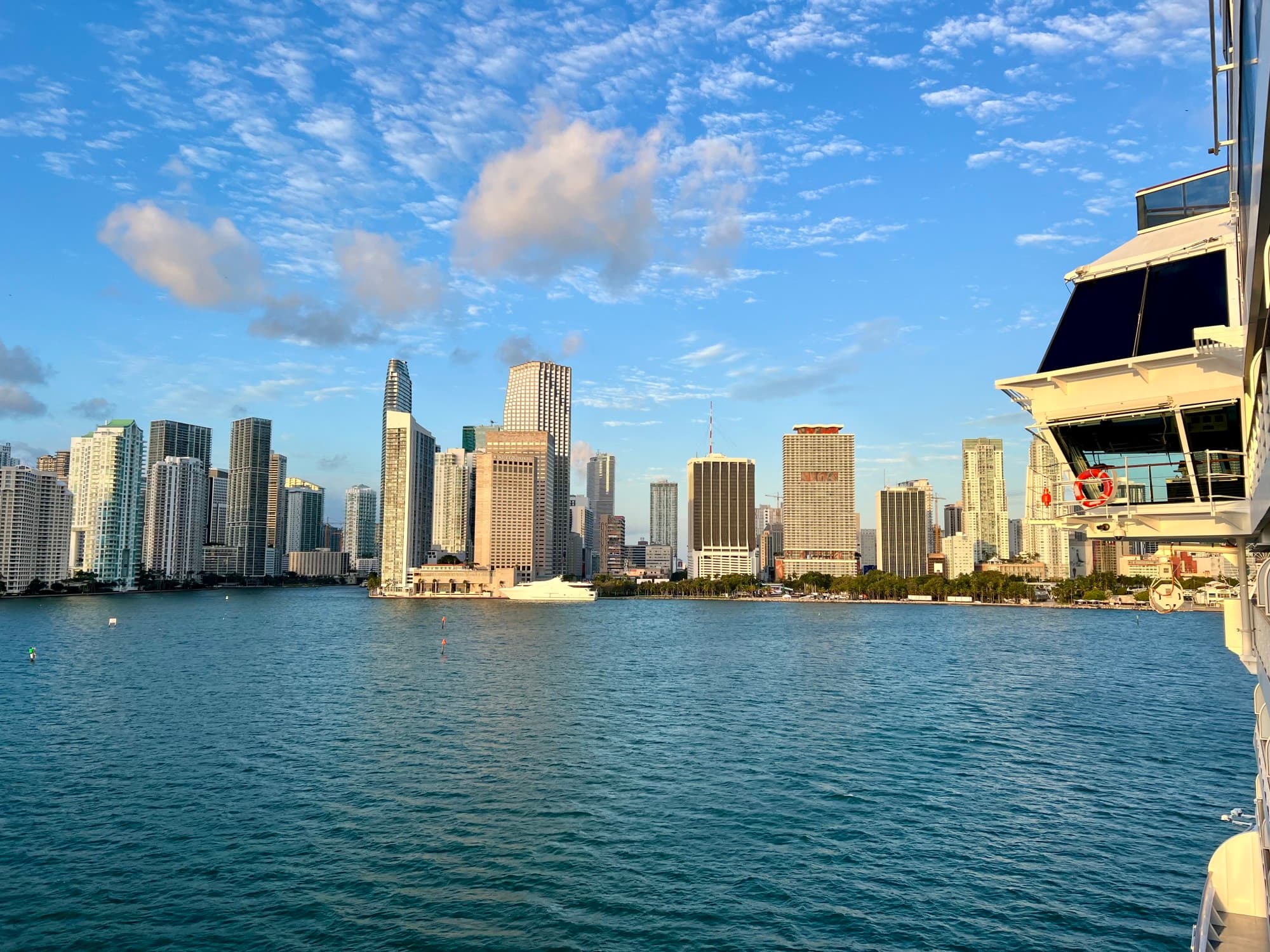 The RSSC Grandeur-s first arrival in Miami, a view from the ship pulling into port with the cityscape ahead.