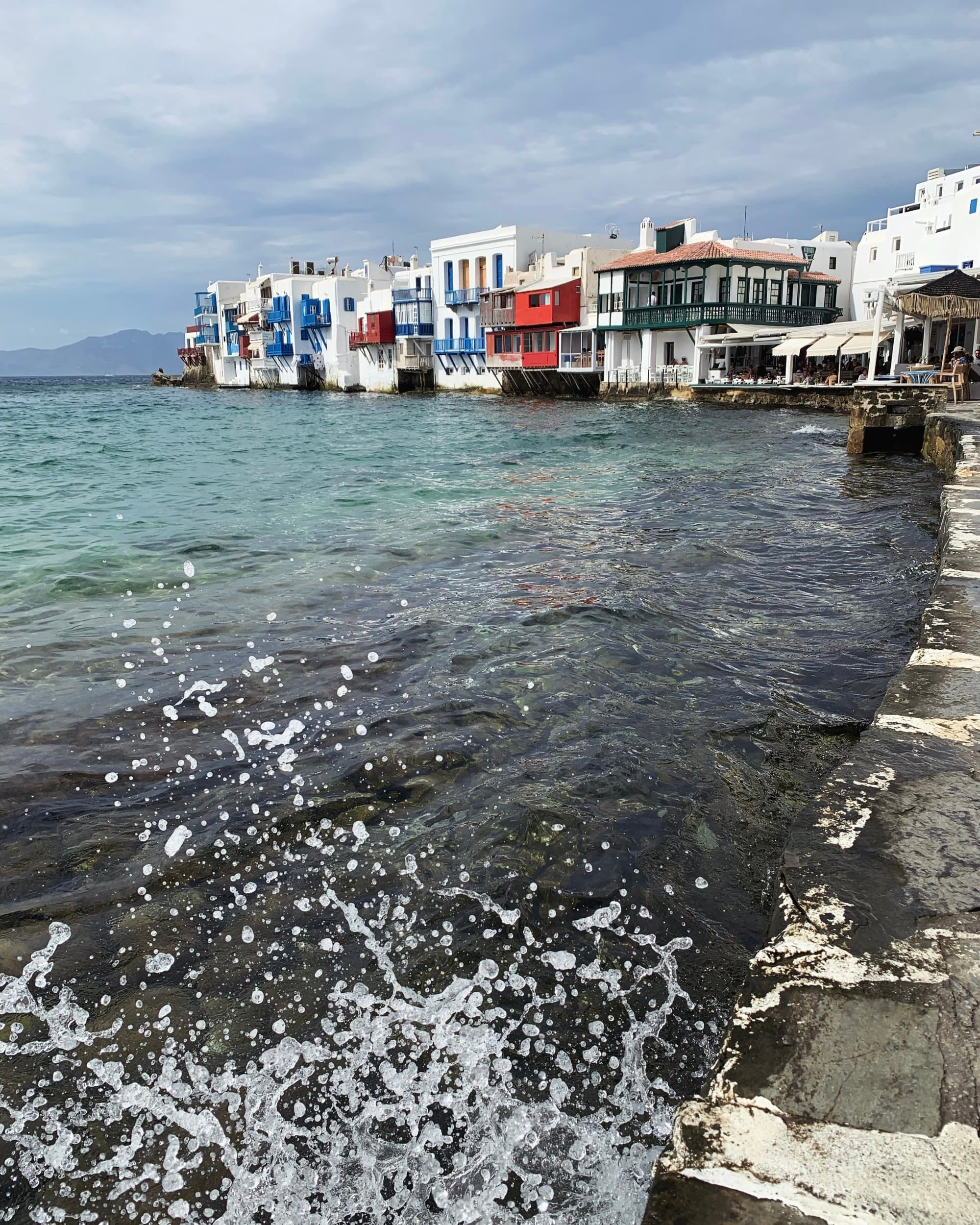 Waterfront buildings next to the ocean.