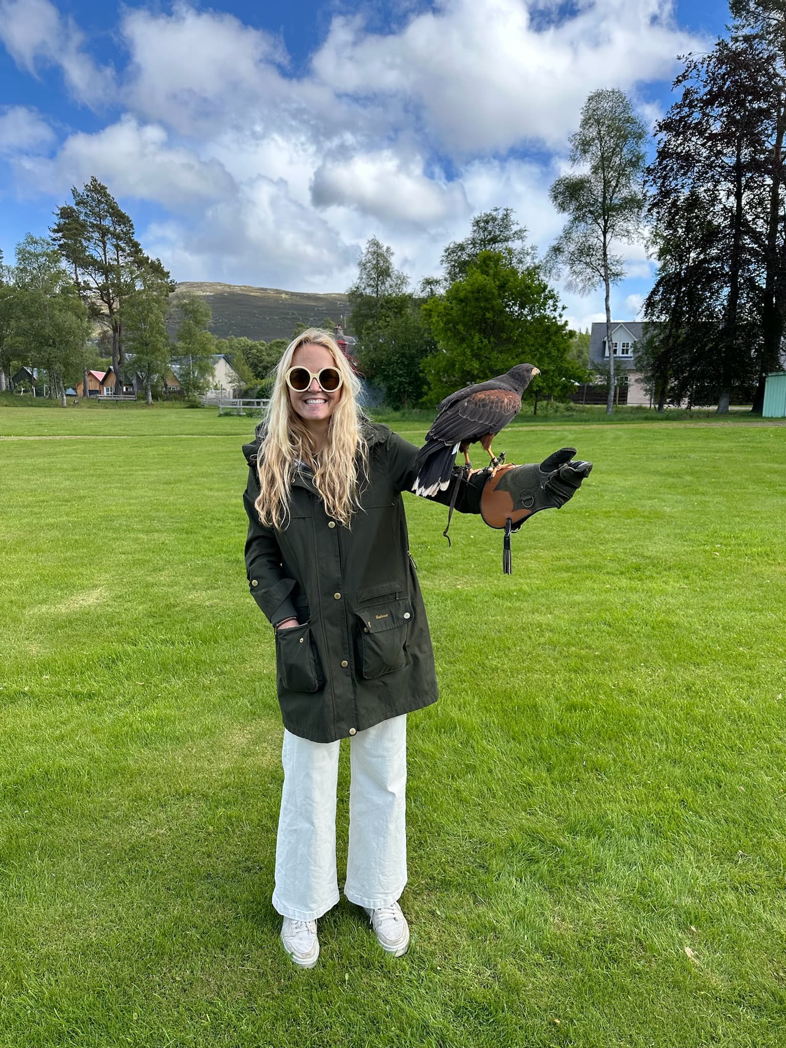 Advisor with a falcon perched on her arm.