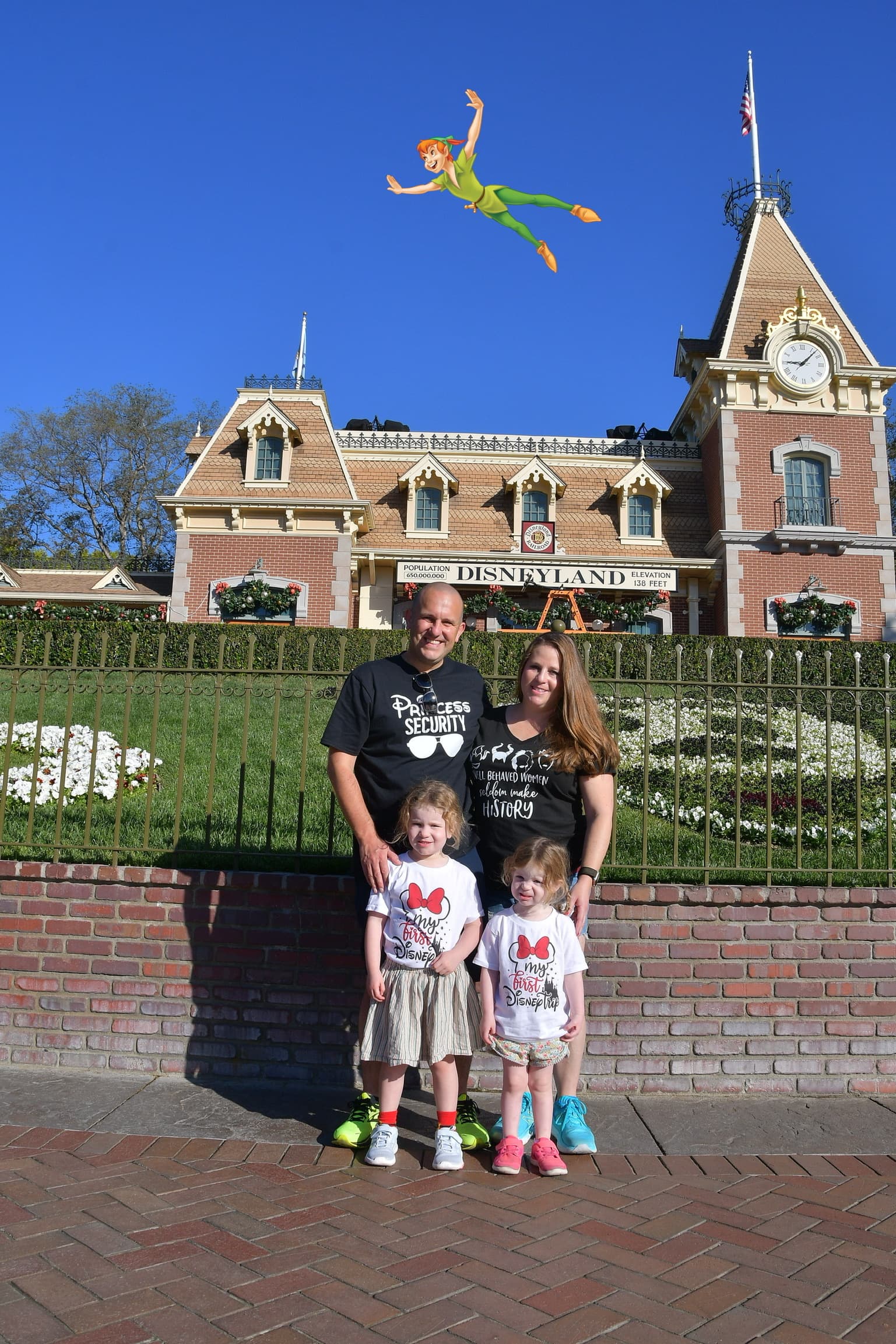 Family photo in front of Disney land