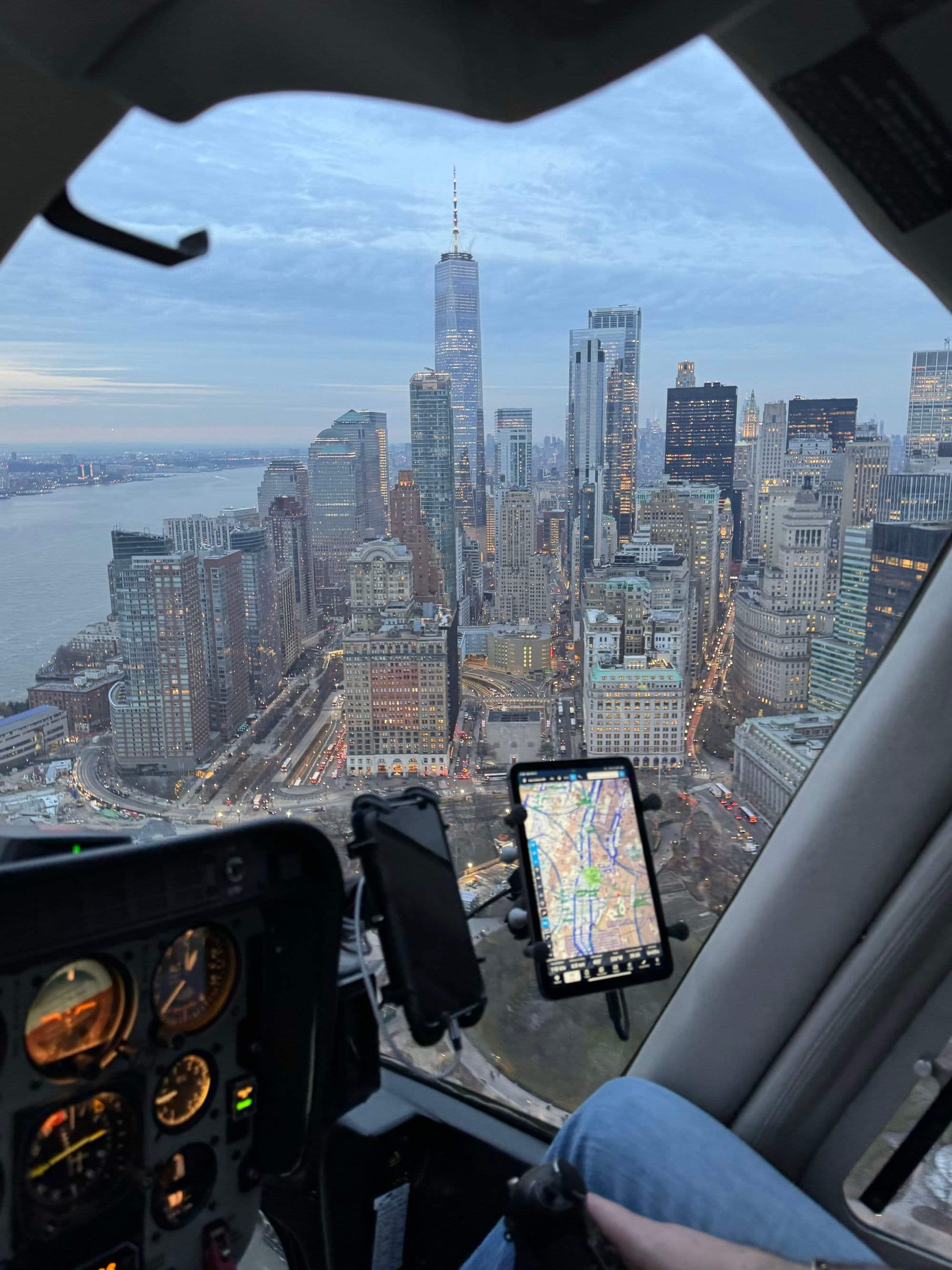 A helicopter view of New York City in the evening.