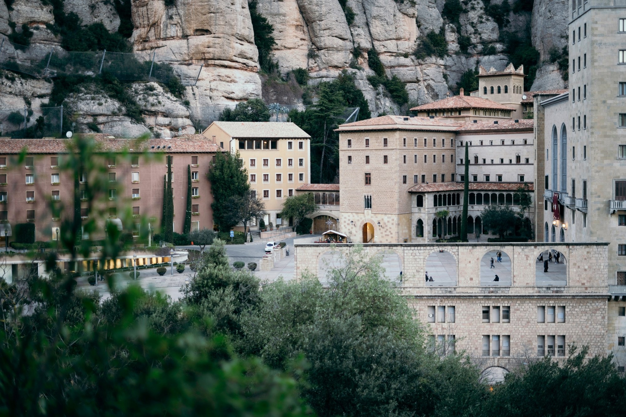 stone buildings near a rocky cliffside in Spain