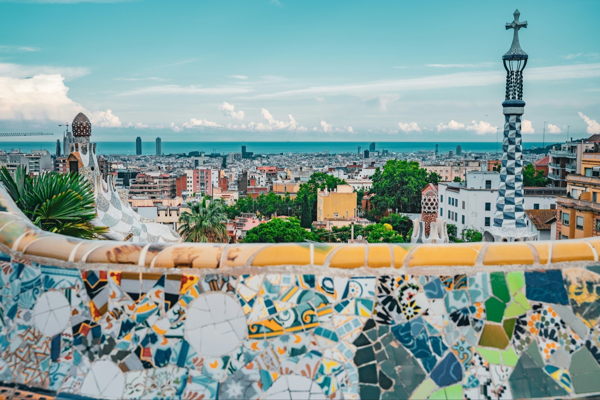 a colorful tiled terrace in Parc Güell in Barcelona