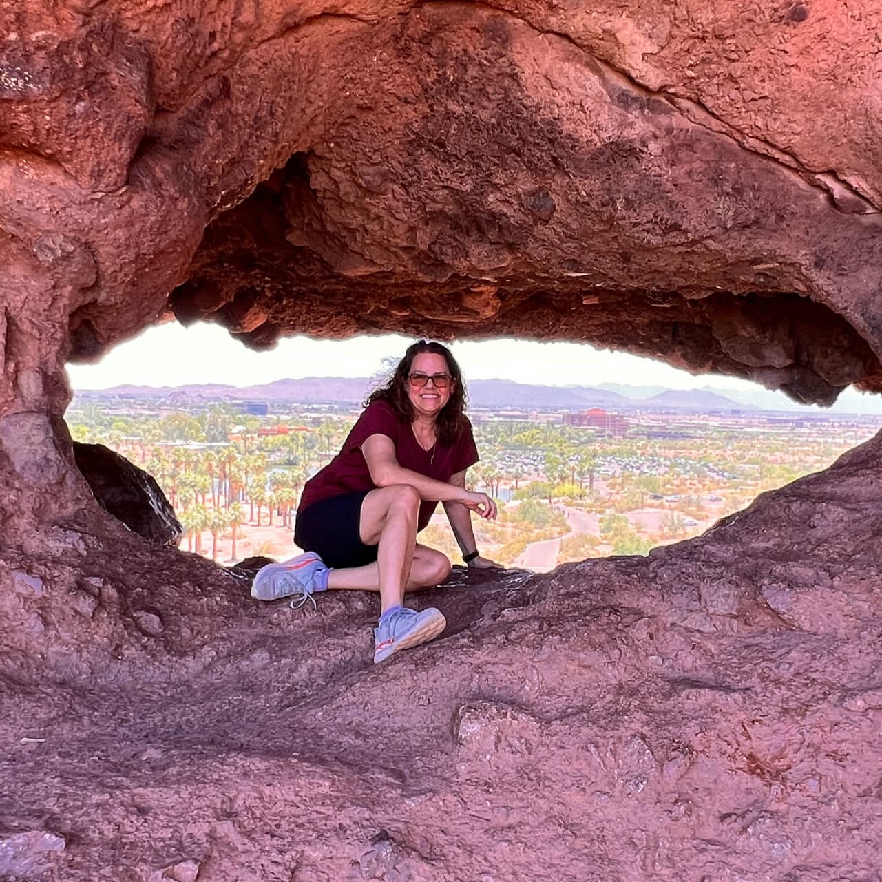 Vivian posing for a photo in Hole in the Rock in Phoenix, Arizona