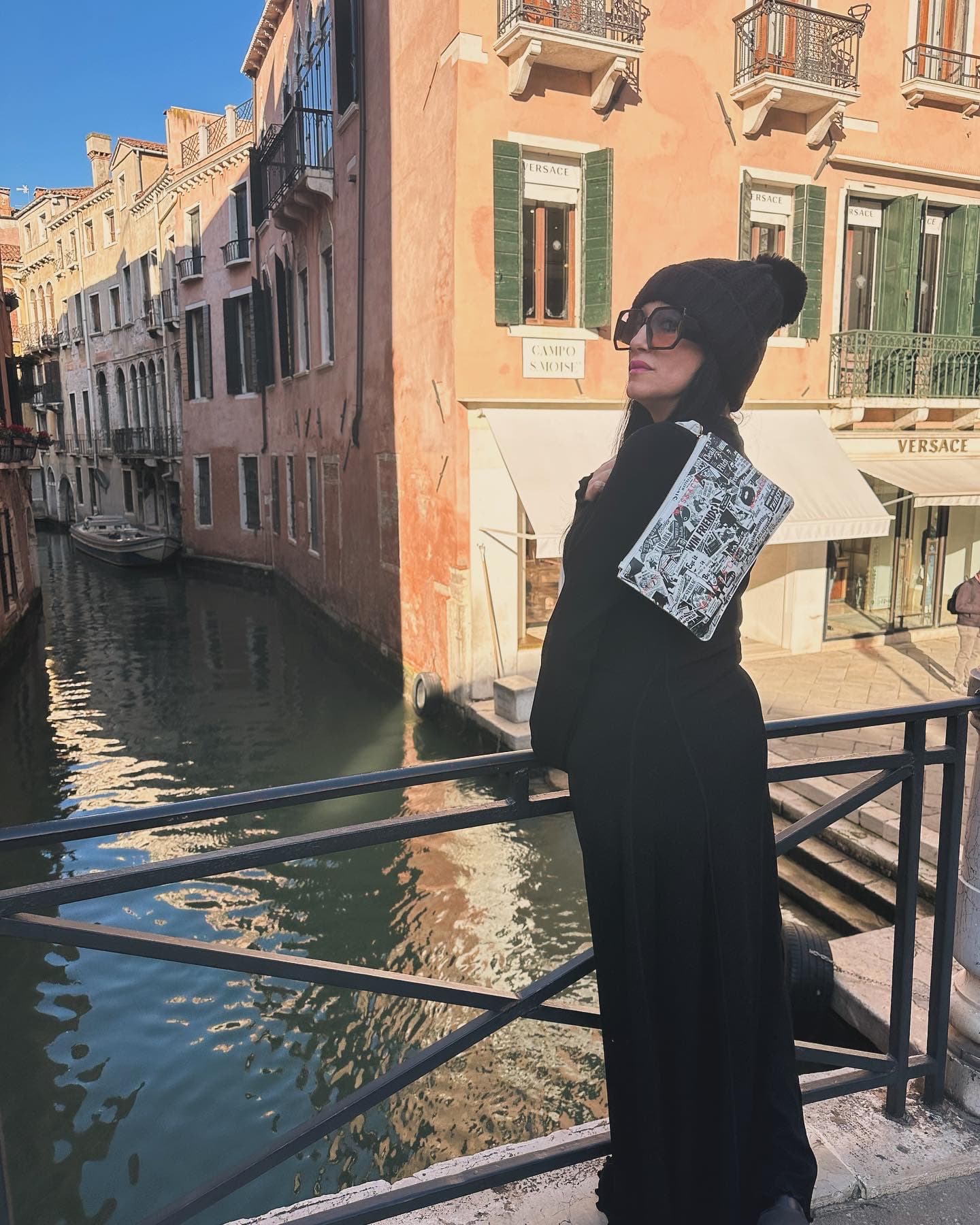 Jaclyn in black dress with canal view