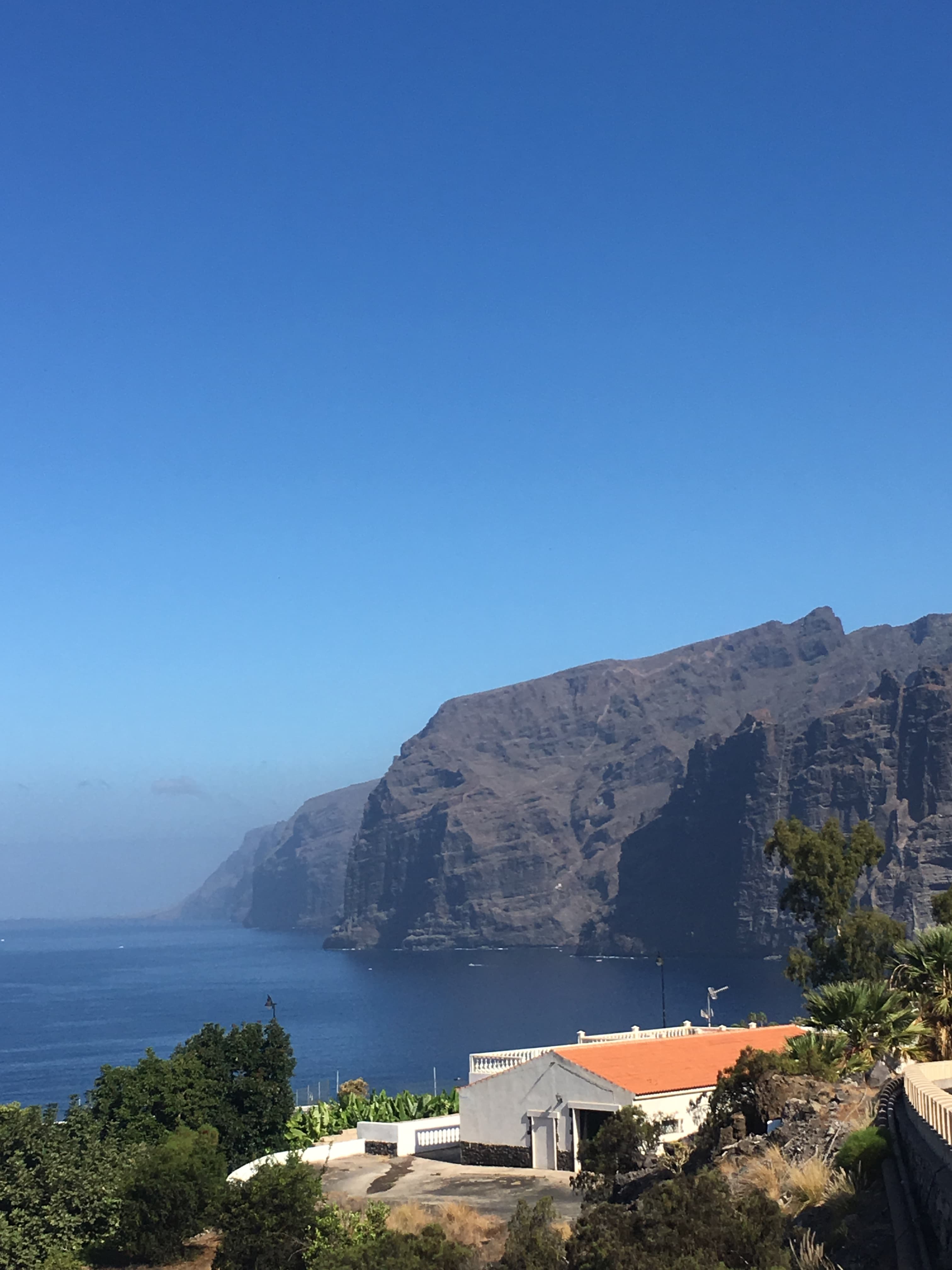 Beautiful view of the cliffs and ocean in Los Gigantes town in Tenerife