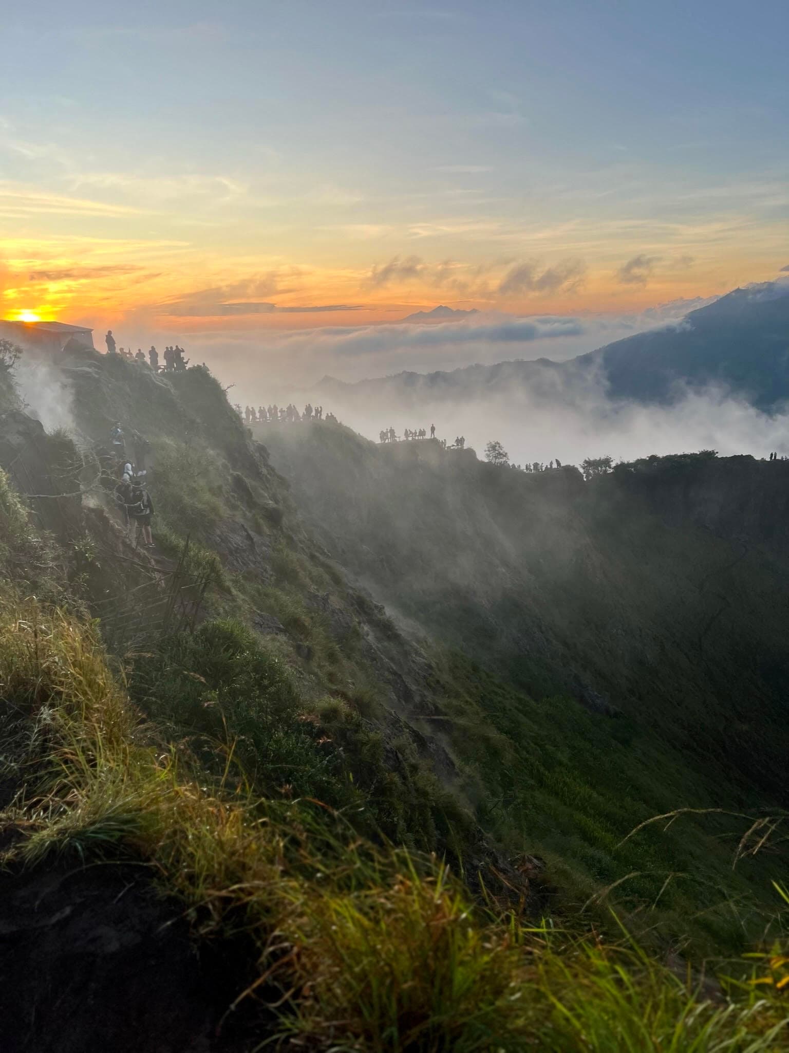 Beautiful view of clouds over Mount Batur in Bali at sunset
