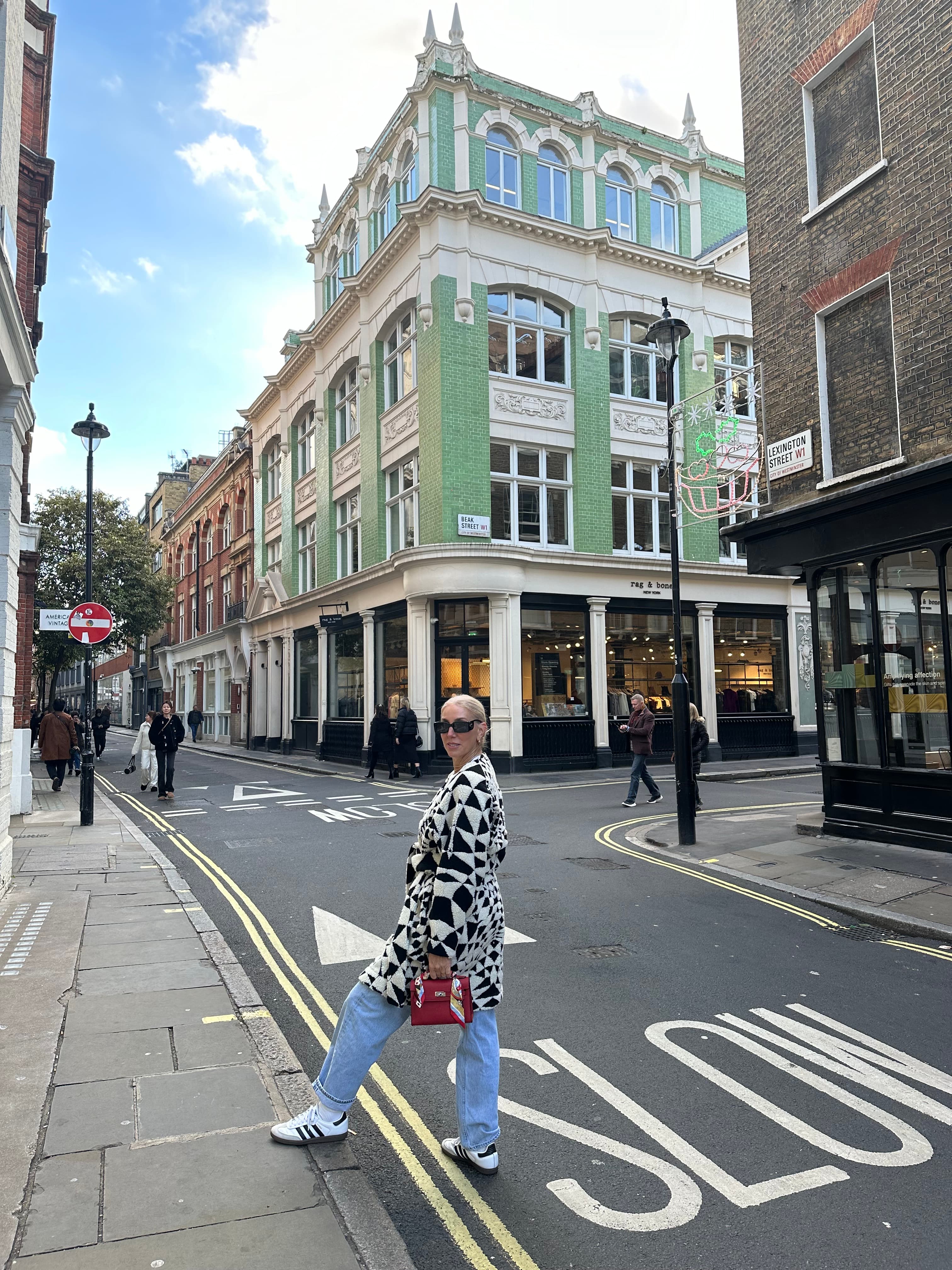 Posing for a photo at Beak Street Alamy