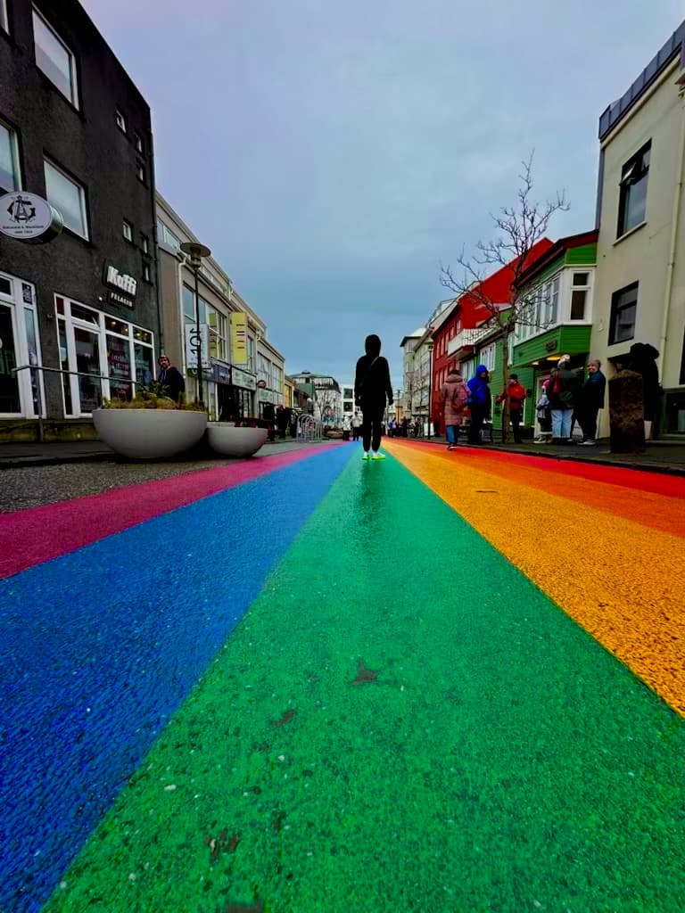 Elizabeth from the back walking down The Rainbow Street in Reykjavik
