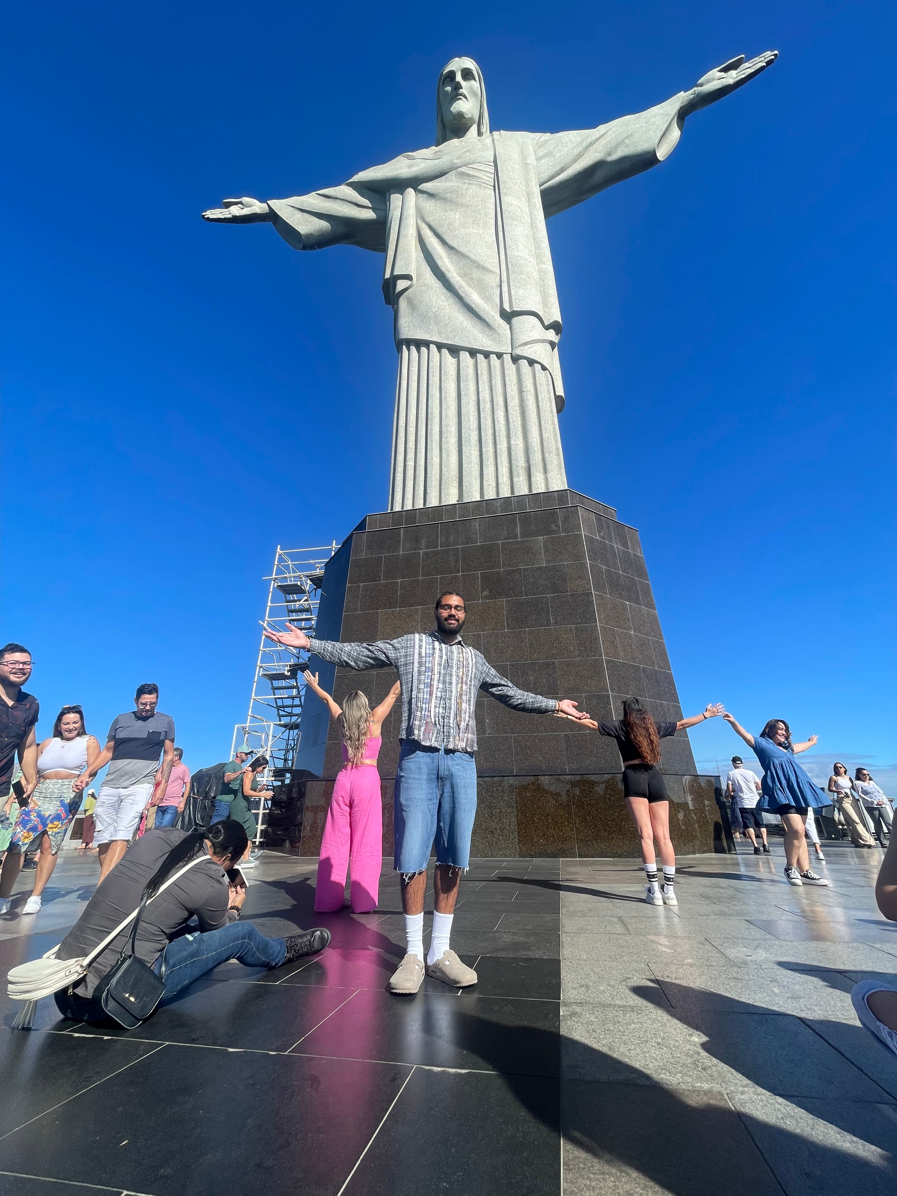 Travel advisor Matthew standing in front of a Christ the Redeemer statue in Rio de Janeiro